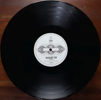 <u>PRESSING INFO</u><br><table class=inf_press><tbody><tr class=inf_info><td class=inf_title>Album:</td><td class=inf_info> Agony & Irony on UK Black  </td></tr>
    <td class=inf_title>Pressing:</td><td> First Pressing /??  </td></tr>
    <td class=inf_title>Release Date:</td><td> 2008  </td></tr>
    <td class=inf_title>Album Pressed:</td><td> 2008  </td></tr>
    <td class=inf_title>Label:</td><td> V2 records - VVR1051181  </td></tr>
    <td class=inf_title>Insert:</td><td> Printed Glossy Inner Sleeve  </td></tr>
    <td class=inf_title>Barcode:</td><td> 5 033197-511818 >  </td></tr>
    <td class=inf_title>Side A Matrix:</td><td> 81818 1A VVR 1051181  </td></tr>
    <td class=inf_title>Side B Matrix:</td><td> 81818 1B VVR 1051181 Francis  </td></tr>
    <td class=inf_title>&nbsp;</td><td> <a href=https://www.discogs.com/release/2170199 target=_blank rel=noopener noreferrer>View This Release on Discogs</a>  </tr></tbody></table>
<br><u>PRICING</u><span class='less' style='padding-left: 8px; color: var(--font-colour_grey);'>(prices shown in USD)</span><br><table class='inf_press'><tbody><tr class='inf_info'>
            <td class='inf_title'>Last Sold:</td>
            <td><span title='Sold for €99.00'>$112.75</span> (May 3, 2026)</td>
            </tr><tr class='inf_info'>
            <td class='inf_title'>History:</td>
            <td>
                <span class='price-low' title='€14.95 · Sold on Jun 17, 2020'>Low: <span class='price-value'>$17.03</span></span>
                <span class='price-separator'>|</span>
                <span class='price-avg'>Avg: <span class='price-value'>$74.91</span></span>
                <span class='price-separator'>|</span>
                <span class='price-high' title='€129.90 · Sold on Feb 22, 2024'>High: <span class='price-value'>$147.94</span></span>
            </td>
            </tr></tbody></table><br>    <br><br><u>TRACKLIST</u><br><table class='inf_tracks'><tbody><tr>
            <td class='inf_num'>A1</td>
            <td class='inf_trk'>Calling All Skeletons</td>
            <td class='inf_len'>3:19</td>
            <td><a href='#' class='lyric-link' data-album-code='ai' data-song-title='Calling All Skeletons'>Lyrics</a></td></tr><tr>
            <td class='inf_num'>A2</td>
            <td class='inf_trk'>Help Me</td>
            <td class='inf_len'>3:45</td>
            <td><a href='#' class='lyric-link' data-album-code='ai' data-song-title='Help Me'>Lyrics</a></td></tr><tr>
            <td class='inf_num'>A3</td>
            <td class='inf_trk'>In Vein</td>
            <td class='inf_len'>3:56</td>
            <td><a href='#' class='lyric-link' data-album-code='ai' data-song-title='In Vein'>Lyrics</a></td></tr><tr>
            <td class='inf_num'>A4</td>
            <td class='inf_trk'>Over And Out</td>
            <td class='inf_len'>3:14</td>
            <td><a href='#' class='lyric-link' data-album-code='ai' data-song-title='Over And Out'>Lyrics</a></td></tr><tr>
            <td class='inf_num'>A5</td>
            <td class='inf_trk'>I Found Away</td>
            <td class='inf_len'>4:01</td>
            <td><a href='#' class='lyric-link' data-album-code='ai' data-song-title='I Found Away'>Lyrics</a></td></tr><tr>
            <td class='inf_num'>A6</td>
            <td class='inf_trk'>Do You Wanna Know?</td>
            <td class='inf_len'>3:36</td>
            <td><a href='#' class='lyric-link' data-album-code='ai' data-song-title='Do You Wanna Know?'>Lyrics</a></td></tr><tr>
            <td class='inf_num'>B1</td>
            <td class='inf_trk'>Live Young, Die Fast</td>
            <td class='inf_len'>4:14</td>
            <td><a href='#' class='lyric-link' data-album-code='ai' data-song-title='Live Young, Die Fast'>Lyrics</a></td></tr><tr>
            <td class='inf_num'>B2</td>
            <td class='inf_trk'>Love Love, Kiss Kiss</td>
            <td class='inf_len'>3:25</td>
            <td><a href='#' class='lyric-link' data-album-code='ai' data-song-title='Love Love, Kiss Kiss'>Lyrics</a></td></tr><tr>
            <td class='inf_num'>B3</td>
            <td class='inf_trk'>Lost And Rendered</td>
            <td class='inf_len'>3:23</td>
            <td><a href='#' class='lyric-link' data-album-code='ai' data-song-title='Lost And Rendered'>Lyrics</a></td></tr><tr>
            <td class='inf_num'>B4</td>
            <td class='inf_trk'>Ruin It</td>
            <td class='inf_len'>3:36</td>
            <td><a href='#' class='lyric-link' data-album-code='ai' data-song-title='Ruin It'>Lyrics</a></td></tr><tr>
            <td class='inf_num'>B5</td>
            <td class='inf_trk'>Into The Night</td>
            <td class='inf_len'>3:23</td>
            <td><a href='#' class='lyric-link' data-album-code='ai' data-song-title='Into The Night'>Lyrics</a></td></tr></tbody></table><br><br>
    <u>NOTES</u><br> Single LP, glossy gatefold sleeve. Printed inner sleeve. Sleeve and center labels are marked with V2 Records/Cooperative Music logos. There are no Epic Records markings on this release.
 - B