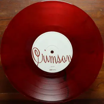 <u>PRESSING INFO</u><br><table class=inf_press><tbody><tr class=inf_info><td class=inf_title>Album:</td><td class=inf_info> Crimson on Red & Black Marble | Red & Black Marble (Newbury Comics Exclusive)  </td></tr>
    <td class=inf_title>Pressing:</td><td> Fourth Pressing /1200  </td></tr>
    <td class=inf_title>Release Date:</td><td> June 9th 2023  </td></tr>
    <td class=inf_title>Album Pressed:</td><td> 2023  </td></tr>
    <td class=inf_title>Label:</td><td> Vagrant Records/BMG - 538801100  </td></tr>
    <td class=inf_title>Insert:</td><td> none  </td></tr>
    <td class=inf_title>Barcode:</td><td> 4 050538-801101  </td></tr>
    <td class=inf_title>Side A Matrix:</td><td> [stamped] MPO®23 301247 [etched] 538801100 A Kr SST  </td></tr>
    <td class=inf_title>Side B Matrix:</td><td> [stamped] MPO®23 302959 [etched] 538801100 B Kr SST  </td></tr>
    <td class=inf_title>Side C Matrix:</td><td> [stamped] MPO®23 302918 [etched] 538801100 C Kr SST  </td></tr>
    <td class=inf_title>Side D Matrix:</td><td> [stamped] MPO®23 302919 [etched] 538801100 D Kr SST  </td></tr>
    <td class=inf_title>&nbsp;</td><td> <a href=https://www.discogs.com/release/27356385 target=_blank rel=noopener noreferrer>View This Release on Discogs</a>  </tr></tbody></table>
<br><u>PRICING</u><span class='less' style='padding-left: 8px; color: var(--font-colour_grey);'>(prices shown in USD)</span><br><table class='inf_press'><tbody><tr class='inf_info'>
            <td class='inf_title'>Last Sold:</td>
            <td>$28.00 (Jun 23, 2026)</td>
            </tr><tr class='inf_info'>
            <td class='inf_title'>History:</td>
            <td>
                <span class='price-low' title='Sold on Oct 3, 2024'>Low: <span class='price-value'>$21.99</span></span>
                <span class='price-separator'>|</span>
                <span class='price-avg'>Avg: <span class='price-value'>$35.16</span></span>
                <span class='price-separator'>|</span>
                <span class='price-high' title='£43.95 · Sold on Jan 7, 2024'>High: <span class='price-value'>$58.53</span></span>
            </td>
            </tr></tbody></table><br>    <br><br><u>TRACKLIST</u><br><table class='inf_tracks'><tbody><tr>
            <td class='inf_num'>A1</td>
            <td class='inf_trk'>Time To Waste</td>
            <td class='inf_len'>4:11</td>
            <td><a href='#' class='lyric-link' data-album-code='crimson' data-song-title='Time To Waste'>Lyrics</a></td></tr><tr>
            <td class='inf_num'>A2</td>
            <td class='inf_trk'>The Poison</td>
            <td class='inf_len'>2:04</td>
            <td><a href='#' class='lyric-link' data-album-code='crimson' data-song-title='The Poison'>Lyrics</a></td></tr><tr>
            <td class='inf_num'>A3</td>
            <td class='inf_trk'>Burn</td>
            <td class='inf_len'>4:05</td>
            <td><a href='#' class='lyric-link' data-album-code='crimson' data-song-title='Burn'>Lyrics</a></td></tr><tr>
            <td class='inf_num'>B1</td>
            <td class='inf_trk'>Mercy Me</td>
            <td class='inf_len'>2:49</td>
            <td><a href='#' class='lyric-link' data-album-code='crimson' data-song-title='Mercy Me'>Lyrics</a></td></tr><tr>
            <td class='inf_num'>B2</td>
            <td class='inf_trk'>Dethbed</td>
            <td class='inf_len'>3:03</td>
            <td><a href='#' class='lyric-link' data-album-code='crimson' data-song-title='Dethbed'>Lyrics</a></td></tr><tr>
            <td class='inf_num'>B3</td>
            <td class='inf_trk'>Settle For Satin</td>
            <td class='inf_len'>3:49</td>
            <td><a href='#' class='lyric-link' data-album-code='crimson' data-song-title='Settle For Satin'>Lyrics</a></td></tr><tr>
            <td class='inf_num'>C1</td>
            <td class='inf_trk'>Sadie</td>
            <td class='inf_len'>4:39</td>
            <td><a href='#' class='lyric-link' data-album-code='crimson' data-song-title='Sadie'>Lyrics</a></td></tr><tr>
            <td class='inf_num'>C2</td>
            <td class='inf_trk'>Fall Victim</td>
            <td class='inf_len'>3:18</td>
            <td><a href='#' class='lyric-link' data-album-code='crimson' data-song-title='Fall Victim'>Lyrics</a></td></tr><tr>
            <td class='inf_num'>C3</td>
            <td class='inf_trk'>I Was A Prayer</td>
            <td class='inf_len'>2:36</td>
            <td><a href='#' class='lyric-link' data-album-code='crimson' data-song-title='I Was A Prayer'>Lyrics</a></td></tr><tr>
            <td class='inf_num'>D1</td>
            <td class='inf_trk'>Prevent This Tragedy</td>
            <td class='inf_len'>3:06</td>
            <td><a href='#' class='lyric-link' data-album-code='crimson' data-song-title='Prevent This Tragedy'>Lyrics</a></td></tr><tr>
            <td class='inf_num'>D2</td>
            <td class='inf_trk'>Back To Hell</td>
            <td class='inf_len'>2:54</td>
            <td><a href='#' class='lyric-link' data-album-code='crimson' data-song-title='Back To Hell'>Lyrics</a></td></tr><tr>
            <td class='inf_num'>D3</td>
            <td class='inf_trk'>Your Neck</td>
            <td class='inf_len'>3:15</td>
            <td><a href='#' class='lyric-link' data-album-code='crimson' data-song-title='Your Neck'>Lyrics</a></td></tr><tr>
            <td class='inf_num'>D4</td>
            <td class='inf_trk'>Smoke</td>
            <td class='inf_len'>2:59</td>
            <td><a href='#' class='lyric-link' data-album-code='crimson' data-song-title='Smoke'>Lyrics</a></td></tr></tbody></table><br><br>
    <u>NOTES</u><br> Vagrant 2023 2x10 Reissue on red and black marble
 - D
