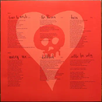 <u>PRESSING INFO</u><br><table class=inf_press><tbody><tr class=inf_info><td class=inf_title>Album:</td><td class=inf_info> Crimson on Red & Black Marble | Red & Black Marble (Newbury Comics Exclusive)  </td></tr>
    <td class=inf_title>Pressing:</td><td> Fourth Pressing /1200  </td></tr>
    <td class=inf_title>Release Date:</td><td> June 9th 2023  </td></tr>
    <td class=inf_title>Album Pressed:</td><td> 2023  </td></tr>
    <td class=inf_title>Label:</td><td> Vagrant Records/BMG - 538801100  </td></tr>
    <td class=inf_title>Insert:</td><td> none  </td></tr>
    <td class=inf_title>Barcode:</td><td> 4 050538-801101  </td></tr>
    <td class=inf_title>Side A Matrix:</td><td> [stamped] MPO®23 301247 [etched] 538801100 A Kr SST  </td></tr>
    <td class=inf_title>Side B Matrix:</td><td> [stamped] MPO®23 302959 [etched] 538801100 B Kr SST  </td></tr>
    <td class=inf_title>Side C Matrix:</td><td> [stamped] MPO®23 302918 [etched] 538801100 C Kr SST  </td></tr>
    <td class=inf_title>Side D Matrix:</td><td> [stamped] MPO®23 302919 [etched] 538801100 D Kr SST  </td></tr>
    <td class=inf_title>&nbsp;</td><td> <a href=https://www.discogs.com/release/27356385 target=_blank rel=noopener noreferrer>View This Release on Discogs</a>  </tr></tbody></table>
<br><u>PRICING</u><span class='less' style='padding-left: 8px; color: var(--font-colour_grey);'>(prices shown in USD)</span><br><table class='inf_press'><tbody><tr class='inf_info'>
            <td class='inf_title'>Last Sold:</td>
            <td>$28.00 (Jun 23, 2026)</td>
            </tr><tr class='inf_info'>
            <td class='inf_title'>History:</td>
            <td>
                <span class='price-low' title='Sold on Oct 3, 2024'>Low: <span class='price-value'>$21.99</span></span>
                <span class='price-separator'>|</span>
                <span class='price-avg'>Avg: <span class='price-value'>$35.16</span></span>
                <span class='price-separator'>|</span>
                <span class='price-high' title='£43.95 · Sold on Jan 7, 2024'>High: <span class='price-value'>$58.53</span></span>
            </td>
            </tr></tbody></table><br>    <br><br><u>TRACKLIST</u><br><table class='inf_tracks'><tbody><tr>
            <td class='inf_num'>A1</td>
            <td class='inf_trk'>Time To Waste</td>
            <td class='inf_len'>4:11</td>
            <td><a href='#' class='lyric-link' data-album-code='crimson' data-song-title='Time To Waste'>Lyrics</a></td></tr><tr>
            <td class='inf_num'>A2</td>
            <td class='inf_trk'>The Poison</td>
            <td class='inf_len'>2:04</td>
            <td><a href='#' class='lyric-link' data-album-code='crimson' data-song-title='The Poison'>Lyrics</a></td></tr><tr>
            <td class='inf_num'>A3</td>
            <td class='inf_trk'>Burn</td>
            <td class='inf_len'>4:05</td>
            <td><a href='#' class='lyric-link' data-album-code='crimson' data-song-title='Burn'>Lyrics</a></td></tr><tr>
            <td class='inf_num'>B1</td>
            <td class='inf_trk'>Mercy Me</td>
            <td class='inf_len'>2:49</td>
            <td><a href='#' class='lyric-link' data-album-code='crimson' data-song-title='Mercy Me'>Lyrics</a></td></tr><tr>
            <td class='inf_num'>B2</td>
            <td class='inf_trk'>Dethbed</td>
            <td class='inf_len'>3:03</td>
            <td><a href='#' class='lyric-link' data-album-code='crimson' data-song-title='Dethbed'>Lyrics</a></td></tr><tr>
            <td class='inf_num'>B3</td>
            <td class='inf_trk'>Settle For Satin</td>
            <td class='inf_len'>3:49</td>
            <td><a href='#' class='lyric-link' data-album-code='crimson' data-song-title='Settle For Satin'>Lyrics</a></td></tr><tr>
            <td class='inf_num'>C1</td>
            <td class='inf_trk'>Sadie</td>
            <td class='inf_len'>4:39</td>
            <td><a href='#' class='lyric-link' data-album-code='crimson' data-song-title='Sadie'>Lyrics</a></td></tr><tr>
            <td class='inf_num'>C2</td>
            <td class='inf_trk'>Fall Victim</td>
            <td class='inf_len'>3:18</td>
            <td><a href='#' class='lyric-link' data-album-code='crimson' data-song-title='Fall Victim'>Lyrics</a></td></tr><tr>
            <td class='inf_num'>C3</td>
            <td class='inf_trk'>I Was A Prayer</td>
            <td class='inf_len'>2:36</td>
            <td><a href='#' class='lyric-link' data-album-code='crimson' data-song-title='I Was A Prayer'>Lyrics</a></td></tr><tr>
            <td class='inf_num'>D1</td>
            <td class='inf_trk'>Prevent This Tragedy</td>
            <td class='inf_len'>3:06</td>
            <td><a href='#' class='lyric-link' data-album-code='crimson' data-song-title='Prevent This Tragedy'>Lyrics</a></td></tr><tr>
            <td class='inf_num'>D2</td>
            <td class='inf_trk'>Back To Hell</td>
            <td class='inf_len'>2:54</td>
            <td><a href='#' class='lyric-link' data-album-code='crimson' data-song-title='Back To Hell'>Lyrics</a></td></tr><tr>
            <td class='inf_num'>D3</td>
            <td class='inf_trk'>Your Neck</td>
            <td class='inf_len'>3:15</td>
            <td><a href='#' class='lyric-link' data-album-code='crimson' data-song-title='Your Neck'>Lyrics</a></td></tr><tr>
            <td class='inf_num'>D4</td>
            <td class='inf_trk'>Smoke</td>
            <td class='inf_len'>2:59</td>
            <td><a href='#' class='lyric-link' data-album-code='crimson' data-song-title='Smoke'>Lyrics</a></td></tr></tbody></table><br><br>
    <u>NOTES</u><br> Vagrant 2023 2x10 Reissue on red and black marble
 - Sleeve2