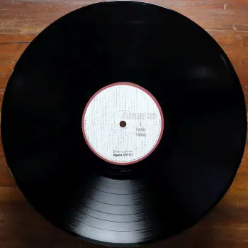 <u>PRESSING INFO</u><br><table class=inf_press><tbody><tr class=inf_info><td class=inf_title>Album:</td><td class=inf_info> From Here To Infirmary on UK Heavyweight Black (Numbered Hassle Exclusive)  </td></tr>
    <td class=inf_title>Pressing:</td><td> Sixth Pressing /500  </td></tr>
    <td class=inf_title>Release Date:</td><td> Dec. 16th 2024  </td></tr>
    <td class=inf_title>Album Pressed:</td><td> 2024  </td></tr>
    <td class=inf_title>Label:</td><td> Vagrant Records/BMG VR4405  </td></tr>
    <td class=inf_title>Insert:</td><td> Double Sided Glossy Cardstock  </td></tr>
    <td class=inf_title>Barcode:</td><td> 5060626463851  </td></tr>
    <td class=inf_title>Side A Matrix:</td><td> 878076-A (stamped) 4 (etched)  </td></tr>
    <td class=inf_title>Side B Matrix:</td><td> 878076-B (stamped) 4 (etched)  </td></tr>
    <td class=inf_title>&nbsp;</td><td> <a href= target=_blank rel=noopener noreferrer>View This Release on Discogs</a>  </tr></tbody></table>
    <br><br><u>TRACKLIST</u><br><table class='inf_tracks'><tbody><tr>
            <td class='inf_num'>A1</td>
            <td class='inf_trk'>Private Eye</td>
            <td class='inf_len'>3:30</td>
            <td><a href='#' class='lyric-link' data-album-code='fhti' data-song-title='Private Eye'>Lyrics</a></td></tr><tr>
            <td class='inf_num'>A2</td>
            <td class='inf_trk'>Mr. Chainsaw</td>
            <td class='inf_len'>3:05</td>
            <td><a href='#' class='lyric-link' data-album-code='fhti' data-song-title='Mr. Chainsaw'>Lyrics</a></td></tr><tr>
            <td class='inf_num'>A3</td>
            <td class='inf_trk'>Take Lots With Alcohol</td>
            <td class='inf_len'>3:13</td>
            <td><a href='#' class='lyric-link' data-album-code='fhti' data-song-title='Take Lots With Alcohol'>Lyrics</a></td></tr><tr>
            <td class='inf_num'>A4</td>
            <td class='inf_trk'>Stupid Kid</td>
            <td class='inf_len'>2:23</td>
            <td><a href='#' class='lyric-link' data-album-code='fhti' data-song-title='Stupid Kid'>Lyrics</a></td></tr><tr>
            <td class='inf_num'>A5</td>
            <td class='inf_trk'>Another Innocent Girl</td>
            <td class='inf_len'>3:37</td>
            <td><a href='#' class='lyric-link' data-album-code='fhti' data-song-title='Another Innocent Girl'>Lyrics</a></td></tr><tr>
            <td class='inf_num'>A6</td>
            <td class='inf_trk'>Steamer Trunk</td>
            <td class='inf_len'>2:50</td>
            <td><a href='#' class='lyric-link' data-album-code='fhti' data-song-title='Steamer Trunk'>Lyrics</a></td></tr><tr>
            <td class='inf_num'>B1</td>
            <td class='inf_trk'>You’re Dead</td>
            <td class='inf_len'>3:50</td>
            <td><a href='#' class='lyric-link' data-album-code='fhti' data-song-title='You’re Dead'>Lyrics</a></td></tr><tr>
            <td class='inf_num'>B2</td>
            <td class='inf_trk'>Armageddon</td>
            <td class='inf_len'>2:49</td>
            <td><a href='#' class='lyric-link' data-album-code='fhti' data-song-title='Armageddon'>Lyrics</a></td></tr><tr>
            <td class='inf_num'>B3</td>
            <td class='inf_trk'>I’m Dying Tomorrow</td>
            <td class='inf_len'>2:18</td>
            <td><a href='#' class='lyric-link' data-album-code='fhti' data-song-title='I’m Dying Tomorrow'>Lyrics</a></td></tr><tr>
            <td class='inf_num'>B4</td>
            <td class='inf_trk'>Bloodied Up</td>
            <td class='inf_len'>2:51</td>
            <td><a href='#' class='lyric-link' data-album-code='fhti' data-song-title='Bloodied Up'>Lyrics</a></td></tr><tr>
            <td class='inf_num'>B5</td>
            <td class='inf_trk'>Trucks And Trains</td>
            <td class='inf_len'>3:16</td>
            <td><a href='#' class='lyric-link' data-album-code='fhti' data-song-title='Trucks And Trains'>Lyrics</a></td></tr><tr>
            <td class='inf_num'>B6</td>
            <td class='inf_trk'>Crawl</td>
            <td class='inf_len'>4:25</td>
            <td><a href='#' class='lyric-link' data-album-code='fhti' data-song-title='Crawl'>Lyrics</a></td></tr></tbody></table><br><br>
    <u>NOTES</u><br> Went up for pre-order at Hassle on November 1st 2024 for a December 16th 2024 release. Identical to the 4th pressing black hassle heavyweight, except this copy has a 4 etched in the matrix runout instead of a 3.
 - B