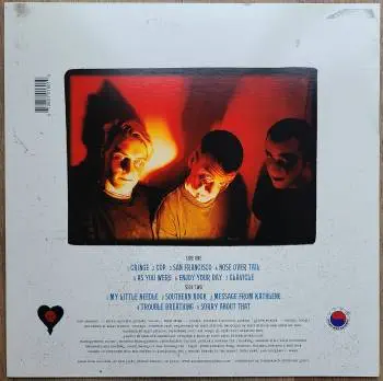 <u>PRESSING INFO</u><br><table class=inf_press><tbody><tr class=inf_info><td class=inf_title>Album:</td><td class=inf_info> Goddamnit Redux on Black  </td></tr>
    <td class=inf_title>Pressing:</td><td> Thirteenth Pressing /500  </td></tr>
    <td class=inf_title>Release Date:</td><td> ?  </td></tr>
    <td class=inf_title>Album Pressed:</td><td> ?  </td></tr>
    <td class=inf_title>Label:</td><td> Asianman Records AM-160  </td></tr>
    <td class=inf_title>Insert:</td><td> Double Sided Glossy  </td></tr>
    <td class=inf_title>Barcode:</td><td> 6 12851-01601 9  </td></tr>
    <td class=inf_title>Side A Matrix:</td><td> [etched] AM-160-A S-65748 [stamped] GOLDEN  </td></tr>
    <td class=inf_title>Side B Matrix:</td><td> [etched] AM-160-B S-65749 [stamped] GOLDEN  </td></tr>
    <td class=inf_title>&nbsp;</td><td> <a href= target=_blank rel=noopener noreferrer>View This Release on Discogs</a>  </tr></tbody></table>
    <br><br><u>TRACKLIST</u><br><table class='inf_tracks'><tbody><tr>
            <td class='inf_num'>A1</td>
            <td class='inf_trk'>Cringe</td>
            <td class='inf_len'>2:23</td>
            <td><a href='#' class='lyric-link' data-album-code='gd' data-song-title='Cringe'>Lyrics</a></td></tr><tr>
            <td class='inf_num'>A2</td>
            <td class='inf_trk'>Cop</td>
            <td class='inf_len'>2:18</td>
            <td><a href='#' class='lyric-link' data-album-code='gd' data-song-title='Cop'>Lyrics</a></td></tr><tr>
            <td class='inf_num'>A3</td>
            <td class='inf_trk'>San Francisco</td>
            <td class='inf_len'>3:52</td>
            <td><a href='#' class='lyric-link' data-album-code='gd' data-song-title='San Francisco'>Lyrics</a></td></tr><tr>
            <td class='inf_num'>A4</td>
            <td class='inf_trk'>Nose Over Tail</td>
            <td class='inf_len'>2:37</td>
            <td><a href='#' class='lyric-link' data-album-code='gd' data-song-title='Nose Over Tail'>Lyrics</a></td></tr><tr>
            <td class='inf_num'>A5</td>
            <td class='inf_trk'>As You Were</td>
            <td class='inf_len'>2:11</td>
            <td><a href='#' class='lyric-link' data-album-code='gd' data-song-title='As You Were'>Lyrics</a></td></tr><tr>
            <td class='inf_num'>A6</td>
            <td class='inf_trk'>Enjoy Your Day</td>
            <td class='inf_len'>2:17</td>
            <td><a href='#' class='lyric-link' data-album-code='gd' data-song-title='Enjoy Your Day'>Lyrics</a></td></tr><tr>
            <td class='inf_num'>A7</td>
            <td class='inf_trk'>Clavicle</td>
            <td class='inf_len'>2:28</td>
            <td><a href='#' class='lyric-link' data-album-code='gd' data-song-title='Clavicle'>Lyrics</a></td></tr><tr>
            <td class='inf_num'>B1</td>
            <td class='inf_trk'>My Little Needle</td>
            <td class='inf_len'>3:01</td>
            <td><a href='#' class='lyric-link' data-album-code='gd' data-song-title='My Little Needle'>Lyrics</a></td></tr><tr>
            <td class='inf_num'>B2</td>
            <td class='inf_trk'>Southern Rock</td>
            <td class='inf_len'>3:05</td>
            <td><a href='#' class='lyric-link' data-album-code='gd' data-song-title='Southern Rock'>Lyrics</a></td></tr><tr>
            <td class='inf_num'>B3</td>
            <td class='inf_trk'>Message From Kathlene</td>
            <td class='inf_len'>3:22</td>
            <td><a href='#' class='lyric-link' data-album-code='gd' data-song-title='Message From Kathlene'>Lyrics</a></td></tr><tr>
            <td class='inf_num'>B4</td>
            <td class='inf_trk'>Trouble Breathing</td>
            <td class='inf_len'>3:55</td>
            <td><a href='#' class='lyric-link' data-album-code='gd' data-song-title='Trouble Breathing'>Lyrics</a></td></tr><tr>
            <td class='inf_num'>B5</td>
            <td class='inf_trk'>Sorry About That</td>
            <td class='inf_len'>3:21</td>
            <td><a href='#' class='lyric-link' data-album-code='gd' data-song-title='Sorry About That'>Lyrics</a></td></tr></tbody></table><br><br>
    <u>NOTES</u><br> The sleeve of this release has a flat finish, compared to previous pressings that had glossy features.
 - Back