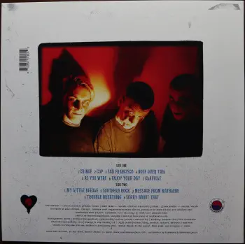 <u>PRESSING INFO</u><br><table class=inf_press><tbody><tr class=inf_info><td class=inf_title>Album:</td><td class=inf_info> Goddamnit Redux on Clear with Magenta Blood Drop (1-2-3-4 Go! Records Exclusive)  </td></tr>
    <td class=inf_title>Pressing:</td><td> Twentieth Pressing /1000  </td></tr>
    <td class=inf_title>Release Date:</td><td> Mar. 15th 2023  </td></tr>
    <td class=inf_title>Album Pressed:</td><td> 2023  </td></tr>
    <td class=inf_title>Label:</td><td> Asianman Records AM-160  </td></tr>
    <td class=inf_title>Insert:</td><td> Double Sided Glossy  </td></tr>
    <td class=inf_title>Barcode:</td><td> 6 12851-01601 9  </td></tr>
    <td class=inf_title>Side A Matrix:</td><td> PIRATES PRESS - AM 034 A 182022E1/B  </td></tr>
    <td class=inf_title>Side B Matrix:</td><td> PIRATES PRESS - AM 034 B 182022E2/C  </td></tr>
    <td class=inf_title>&nbsp;</td><td> <a href=https://www.discogs.com/release/26598896-Alkaline-Trio-Goddamnit target=_blank rel=noopener noreferrer>View This Release on Discogs</a>  </tr></tbody></table>
<br><u>PRICING</u><span class='less' style='padding-left: 8px; color: var(--font-colour_grey);'>(prices shown in USD)</span><br><table class='inf_press'><tbody><tr class='inf_info'>
            <td class='inf_title'>Last Sold:</td>
            <td>$25.99 (Jun 26, 2026)</td>
            </tr><tr class='inf_info'>
            <td class='inf_title'>History:</td>
            <td>
                <span class='price-low' title='Sold on Jun 2, 2025'>Low: <span class='price-value'>$17.00</span></span>
                <span class='price-separator'>|</span>
                <span class='price-avg'>Avg: <span class='price-value'>$27.04</span></span>
                <span class='price-separator'>|</span>
                <span class='price-high' title='€36.00 · Sold on Mar 2, 2025'>High: <span class='price-value'>$41.00</span></span>
            </td>
            </tr></tbody></table><br>    <br><br><u>TRACKLIST</u><br><table class='inf_tracks'><tbody><tr>
            <td class='inf_num'>A1</td>
            <td class='inf_trk'>Cringe</td>
            <td class='inf_len'>2:23</td>
            <td><a href='#' class='lyric-link' data-album-code='gd' data-song-title='Cringe'>Lyrics</a></td></tr><tr>
            <td class='inf_num'>A2</td>
            <td class='inf_trk'>Cop</td>
            <td class='inf_len'>2:18</td>
            <td><a href='#' class='lyric-link' data-album-code='gd' data-song-title='Cop'>Lyrics</a></td></tr><tr>
            <td class='inf_num'>A3</td>
            <td class='inf_trk'>San Francisco</td>
            <td class='inf_len'>3:52</td>
            <td><a href='#' class='lyric-link' data-album-code='gd' data-song-title='San Francisco'>Lyrics</a></td></tr><tr>
            <td class='inf_num'>A4</td>
            <td class='inf_trk'>Nose Over Tail</td>
            <td class='inf_len'>2:37</td>
            <td><a href='#' class='lyric-link' data-album-code='gd' data-song-title='Nose Over Tail'>Lyrics</a></td></tr><tr>
            <td class='inf_num'>A5</td>
            <td class='inf_trk'>As You Were</td>
            <td class='inf_len'>2:11</td>
            <td><a href='#' class='lyric-link' data-album-code='gd' data-song-title='As You Were'>Lyrics</a></td></tr><tr>
            <td class='inf_num'>A6</td>
            <td class='inf_trk'>Enjoy Your Day</td>
            <td class='inf_len'>2:17</td>
            <td><a href='#' class='lyric-link' data-album-code='gd' data-song-title='Enjoy Your Day'>Lyrics</a></td></tr><tr>
            <td class='inf_num'>A7</td>
            <td class='inf_trk'>Clavicle</td>
            <td class='inf_len'>2:28</td>
            <td><a href='#' class='lyric-link' data-album-code='gd' data-song-title='Clavicle'>Lyrics</a></td></tr><tr>
            <td class='inf_num'>B1</td>
            <td class='inf_trk'>My Little Needle</td>
            <td class='inf_len'>3:01</td>
            <td><a href='#' class='lyric-link' data-album-code='gd' data-song-title='My Little Needle'>Lyrics</a></td></tr><tr>
            <td class='inf_num'>B2</td>
            <td class='inf_trk'>Southern Rock</td>
            <td class='inf_len'>3:05</td>
            <td><a href='#' class='lyric-link' data-album-code='gd' data-song-title='Southern Rock'>Lyrics</a></td></tr><tr>
            <td class='inf_num'>B3</td>
            <td class='inf_trk'>Message From Kathlene</td>
            <td class='inf_len'>3:22</td>
            <td><a href='#' class='lyric-link' data-album-code='gd' data-song-title='Message From Kathlene'>Lyrics</a></td></tr><tr>
            <td class='inf_num'>B4</td>
            <td class='inf_trk'>Trouble Breathing</td>
            <td class='inf_len'>3:55</td>
            <td><a href='#' class='lyric-link' data-album-code='gd' data-song-title='Trouble Breathing'>Lyrics</a></td></tr><tr>
            <td class='inf_num'>B5</td>
            <td class='inf_trk'>Sorry About That</td>
            <td class='inf_len'>3:21</td>
            <td><a href='#' class='lyric-link' data-album-code='gd' data-song-title='Sorry About That'>Lyrics</a></td></tr></tbody></table><br><br>
    <u>NOTES</u><br> The insert has a thin white border, and the former DVD order form is now covered by Heart/Skull logos. Center labels are Clock/Skiba again. This release has the original Goddamnit catalog number stamped in the runout (AM 034) instead of the correct AM-160. This is the remastered Redux version. The sleeve of this release has a flat finish, compared to previous pressings that had glossy features.
 - Back