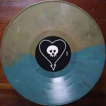 <u>PRESSING INFO</u><br><table class=inf_press><tbody><tr class=inf_info><td class=inf_title>Album:</td><td class=inf_info> Goddamnit Redux on Random Colour 'Half Olive / Half Mint Green'  </td></tr>
    <td class=inf_title>Pressing:</td><td> Sixteenth Pressing /1000  </td></tr>
    <td class=inf_title>Release Date:</td><td> Feb. 15th 2021  </td></tr>
    <td class=inf_title>Album Pressed:</td><td> 2021  </td></tr>
    <td class=inf_title>Label:</td><td> Asianman Records AM-160  </td></tr>
    <td class=inf_title>Insert:</td><td> Double Sided Glossy  </td></tr>
    <td class=inf_title>Barcode:</td><td> 6 12851-01601 9  </td></tr>
    <td class=inf_title>Side A Matrix:</td><td> [etched] AM-160-A S-65748 [stamped] GOLDEN  </td></tr>
    <td class=inf_title>Side B Matrix:</td><td> [etched] AM-160-B S-65749 [stamped] GOLDEN  </td></tr>
    <td class=inf_title>&nbsp;</td><td> <a href=https://www.discogs.com/release/17544028-Alkaline-Trio-Goddamnit target=_blank rel=noopener noreferrer>View This Release on Discogs</a>  </tr></tbody></table>
<br><u>PRICING</u><span class='less' style='padding-left: 8px; color: var(--font-colour_grey);'>(prices shown in USD)</span><br><table class='inf_press'><tbody><tr class='inf_info'>
            <td class='inf_title'>Last Sold:</td>
            <td>$33.15 (Feb 7, 2025)</td>
            </tr><tr class='inf_info'>
            <td class='inf_title'>History:</td>
            <td>
                <span class='price-low' title='Sold on Aug 29, 2021'>Low: <span class='price-value'>$15.00</span></span>
                <span class='price-separator'>|</span>
                <span class='price-avg'>Avg: <span class='price-value'>$29.77</span></span>
                <span class='price-separator'>|</span>
                <span class='price-high' title='Sold on Jun 17, 2021'>High: <span class='price-value'>$39.99</span></span>
            </td>
            </tr></tbody></table><br>    <br><br><u>TRACKLIST</u><br><table class='inf_tracks'><tbody><tr>
            <td class='inf_num'>A1</td>
            <td class='inf_trk'>Cringe</td>
            <td class='inf_len'>2:23</td>
            <td><a href='#' class='lyric-link' data-album-code='gd' data-song-title='Cringe'>Lyrics</a></td></tr><tr>
            <td class='inf_num'>A2</td>
            <td class='inf_trk'>Cop</td>
            <td class='inf_len'>2:18</td>
            <td><a href='#' class='lyric-link' data-album-code='gd' data-song-title='Cop'>Lyrics</a></td></tr><tr>
            <td class='inf_num'>A3</td>
            <td class='inf_trk'>San Francisco</td>
            <td class='inf_len'>3:52</td>
            <td><a href='#' class='lyric-link' data-album-code='gd' data-song-title='San Francisco'>Lyrics</a></td></tr><tr>
            <td class='inf_num'>A4</td>
            <td class='inf_trk'>Nose Over Tail</td>
            <td class='inf_len'>2:37</td>
            <td><a href='#' class='lyric-link' data-album-code='gd' data-song-title='Nose Over Tail'>Lyrics</a></td></tr><tr>
            <td class='inf_num'>A5</td>
            <td class='inf_trk'>As You Were</td>
            <td class='inf_len'>2:11</td>
            <td><a href='#' class='lyric-link' data-album-code='gd' data-song-title='As You Were'>Lyrics</a></td></tr><tr>
            <td class='inf_num'>A6</td>
            <td class='inf_trk'>Enjoy Your Day</td>
            <td class='inf_len'>2:17</td>
            <td><a href='#' class='lyric-link' data-album-code='gd' data-song-title='Enjoy Your Day'>Lyrics</a></td></tr><tr>
            <td class='inf_num'>A7</td>
            <td class='inf_trk'>Clavicle</td>
            <td class='inf_len'>2:28</td>
            <td><a href='#' class='lyric-link' data-album-code='gd' data-song-title='Clavicle'>Lyrics</a></td></tr><tr>
            <td class='inf_num'>B1</td>
            <td class='inf_trk'>My Little Needle</td>
            <td class='inf_len'>3:01</td>
            <td><a href='#' class='lyric-link' data-album-code='gd' data-song-title='My Little Needle'>Lyrics</a></td></tr><tr>
            <td class='inf_num'>B2</td>
            <td class='inf_trk'>Southern Rock</td>
            <td class='inf_len'>3:05</td>
            <td><a href='#' class='lyric-link' data-album-code='gd' data-song-title='Southern Rock'>Lyrics</a></td></tr><tr>
            <td class='inf_num'>B3</td>
            <td class='inf_trk'>Message From Kathlene</td>
            <td class='inf_len'>3:22</td>
            <td><a href='#' class='lyric-link' data-album-code='gd' data-song-title='Message From Kathlene'>Lyrics</a></td></tr><tr>
            <td class='inf_num'>B4</td>
            <td class='inf_trk'>Trouble Breathing</td>
            <td class='inf_len'>3:55</td>
            <td><a href='#' class='lyric-link' data-album-code='gd' data-song-title='Trouble Breathing'>Lyrics</a></td></tr><tr>
            <td class='inf_num'>B5</td>
            <td class='inf_trk'>Sorry About That</td>
            <td class='inf_len'>3:21</td>
            <td><a href='#' class='lyric-link' data-album-code='gd' data-song-title='Sorry About That'>Lyrics</a></td></tr></tbody></table><br><br>
    <u>NOTES</u><br> Thin white border around insert. Former DVD order form is now covered by Heart/Skull logos. Center labels are black Heart/Skull logos. The sleeve of this release has a flat finish, compared to previous pressings that had glossy features.
 - B