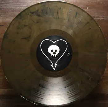 <u>PRESSING INFO</u><br><table class=inf_press><tbody><tr class=inf_info><td class=inf_title>Album:</td><td class=inf_info> Goddamnit Redux on Random Colour 'Brown Marble'  </td></tr>
    <td class=inf_title>Pressing:</td><td> Eighteenth Pressing V.2 /500  </td></tr>
    <td class=inf_title>Release Date:</td><td> Oct. 30th 2023  </td></tr>
    <td class=inf_title>Album Pressed:</td><td> 2022  </td></tr>
    <td class=inf_title>Label:</td><td> Asianman Records AM-160  </td></tr>
    <td class=inf_title>Insert:</td><td> Double Sided Glossy  </td></tr>
    <td class=inf_title>Barcode:</td><td> 6 12851-01601 9  </td></tr>
    <td class=inf_title>Side A Matrix:</td><td> [etched] AM-160-A S-65748 [stamped] GOLDEN  </td></tr>
    <td class=inf_title>Side B Matrix:</td><td> [etched] AM-160-B S-65749 [stamped] GOLDEN  </td></tr>
    <td class=inf_title>&nbsp;</td><td> <a href=https://www.discogs.com/release/22437724-Alkaline-Trio-Goddamnit target=_blank rel=noopener noreferrer>View This Release on Discogs</a>  </tr></tbody></table>
<br><u>PRICING</u><span class='less' style='padding-left: 8px; color: var(--font-colour_grey);'>(prices shown in USD)</span><br><table class='inf_press'><tbody><tr class='inf_info'>
            <td class='inf_title'>Last Sold:</td>
            <td>$25.00 (Jul 3, 2026)</td>
            </tr><tr class='inf_info'>
            <td class='inf_title'>History:</td>
            <td>
                <span class='price-low' title='Sold on Apr 27, 2023'>Low: <span class='price-value'>$14.99</span></span>
                <span class='price-separator'>|</span>
                <span class='price-avg'>Avg: <span class='price-value'>$21.07</span></span>
                <span class='price-separator'>|</span>
                <span class='price-high' title='Sold on Jan 26, 2025'>High: <span class='price-value'>$30.00</span></span>
            </td>
            </tr></tbody></table><br>    <br><br><u>TRACKLIST</u><br><table class='inf_tracks'><tbody><tr>
            <td class='inf_num'>A1</td>
            <td class='inf_trk'>Cringe</td>
            <td class='inf_len'>2:23</td>
            <td><a href='#' class='lyric-link' data-album-code='gd' data-song-title='Cringe'>Lyrics</a></td></tr><tr>
            <td class='inf_num'>A2</td>
            <td class='inf_trk'>Cop</td>
            <td class='inf_len'>2:18</td>
            <td><a href='#' class='lyric-link' data-album-code='gd' data-song-title='Cop'>Lyrics</a></td></tr><tr>
            <td class='inf_num'>A3</td>
            <td class='inf_trk'>San Francisco</td>
            <td class='inf_len'>3:52</td>
            <td><a href='#' class='lyric-link' data-album-code='gd' data-song-title='San Francisco'>Lyrics</a></td></tr><tr>
            <td class='inf_num'>A4</td>
            <td class='inf_trk'>Nose Over Tail</td>
            <td class='inf_len'>2:37</td>
            <td><a href='#' class='lyric-link' data-album-code='gd' data-song-title='Nose Over Tail'>Lyrics</a></td></tr><tr>
            <td class='inf_num'>A5</td>
            <td class='inf_trk'>As You Were</td>
            <td class='inf_len'>2:11</td>
            <td><a href='#' class='lyric-link' data-album-code='gd' data-song-title='As You Were'>Lyrics</a></td></tr><tr>
            <td class='inf_num'>A6</td>
            <td class='inf_trk'>Enjoy Your Day</td>
            <td class='inf_len'>2:17</td>
            <td><a href='#' class='lyric-link' data-album-code='gd' data-song-title='Enjoy Your Day'>Lyrics</a></td></tr><tr>
            <td class='inf_num'>A7</td>
            <td class='inf_trk'>Clavicle</td>
            <td class='inf_len'>2:28</td>
            <td><a href='#' class='lyric-link' data-album-code='gd' data-song-title='Clavicle'>Lyrics</a></td></tr><tr>
            <td class='inf_num'>B1</td>
            <td class='inf_trk'>My Little Needle</td>
            <td class='inf_len'>3:01</td>
            <td><a href='#' class='lyric-link' data-album-code='gd' data-song-title='My Little Needle'>Lyrics</a></td></tr><tr>
            <td class='inf_num'>B2</td>
            <td class='inf_trk'>Southern Rock</td>
            <td class='inf_len'>3:05</td>
            <td><a href='#' class='lyric-link' data-album-code='gd' data-song-title='Southern Rock'>Lyrics</a></td></tr><tr>
            <td class='inf_num'>B3</td>
            <td class='inf_trk'>Message From Kathlene</td>
            <td class='inf_len'>3:22</td>
            <td><a href='#' class='lyric-link' data-album-code='gd' data-song-title='Message From Kathlene'>Lyrics</a></td></tr><tr>
            <td class='inf_num'>B4</td>
            <td class='inf_trk'>Trouble Breathing</td>
            <td class='inf_len'>3:55</td>
            <td><a href='#' class='lyric-link' data-album-code='gd' data-song-title='Trouble Breathing'>Lyrics</a></td></tr><tr>
            <td class='inf_num'>B5</td>
            <td class='inf_trk'>Sorry About That</td>
            <td class='inf_len'>3:21</td>
            <td><a href='#' class='lyric-link' data-album-code='gd' data-song-title='Sorry About That'>Lyrics</a></td></tr></tbody></table><br><br>
    <u>NOTES</u><br> Released on 'Random Eco Vinyl' at Devil Dog Distro. According to Mike Park DD Distro received this in a box marked distro and are part of the earlier released 18th pressing.
 - B