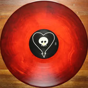<u>PRESSING INFO</u><br><table class=inf_press><tbody><tr class=inf_info><td class=inf_title>Album:</td><td class=inf_info> Goddamnit Redux on Random Colour 'Clear Red with Smoke'  </td></tr>
    <td class=inf_title>Pressing:</td><td> Eighteenth Pressing V.2 /500  </td></tr>
    <td class=inf_title>Release Date:</td><td> Oct. 30th 2023  </td></tr>
    <td class=inf_title>Album Pressed:</td><td> 2022  </td></tr>
    <td class=inf_title>Label:</td><td> Asianman Records AM-160  </td></tr>
    <td class=inf_title>Insert:</td><td> Double Sided Glossy  </td></tr>
    <td class=inf_title>Barcode:</td><td> 6 12851-01601 9  </td></tr>
    <td class=inf_title>Side A Matrix:</td><td> [etched] AM-160-A S-65748 [stamped] GOLDEN  </td></tr>
    <td class=inf_title>Side B Matrix:</td><td> [etched] AM-160-B S-65749 [stamped] GOLDEN  </td></tr>
    <td class=inf_title>&nbsp;</td><td> <a href=https://www.discogs.com/release/22437724-Alkaline-Trio-Goddamnit target=_blank rel=noopener noreferrer>View This Release on Discogs</a>  </tr></tbody></table>
<br><u>PRICING</u><span class='less' style='padding-left: 8px; color: var(--font-colour_grey);'>(prices shown in USD)</span><br><table class='inf_press'><tbody><tr class='inf_info'>
            <td class='inf_title'>Last Sold:</td>
            <td>$25.00 (Jul 3, 2026)</td>
            </tr><tr class='inf_info'>
            <td class='inf_title'>History:</td>
            <td>
                <span class='price-low' title='Sold on Apr 27, 2023'>Low: <span class='price-value'>$14.99</span></span>
                <span class='price-separator'>|</span>
                <span class='price-avg'>Avg: <span class='price-value'>$21.07</span></span>
                <span class='price-separator'>|</span>
                <span class='price-high' title='Sold on Jan 26, 2025'>High: <span class='price-value'>$30.00</span></span>
            </td>
            </tr></tbody></table><br>    <br><br><u>TRACKLIST</u><br><table class='inf_tracks'><tbody><tr>
            <td class='inf_num'>A1</td>
            <td class='inf_trk'>Cringe</td>
            <td class='inf_len'>2:23</td>
            <td><a href='#' class='lyric-link' data-album-code='gd' data-song-title='Cringe'>Lyrics</a></td></tr><tr>
            <td class='inf_num'>A2</td>
            <td class='inf_trk'>Cop</td>
            <td class='inf_len'>2:18</td>
            <td><a href='#' class='lyric-link' data-album-code='gd' data-song-title='Cop'>Lyrics</a></td></tr><tr>
            <td class='inf_num'>A3</td>
            <td class='inf_trk'>San Francisco</td>
            <td class='inf_len'>3:52</td>
            <td><a href='#' class='lyric-link' data-album-code='gd' data-song-title='San Francisco'>Lyrics</a></td></tr><tr>
            <td class='inf_num'>A4</td>
            <td class='inf_trk'>Nose Over Tail</td>
            <td class='inf_len'>2:37</td>
            <td><a href='#' class='lyric-link' data-album-code='gd' data-song-title='Nose Over Tail'>Lyrics</a></td></tr><tr>
            <td class='inf_num'>A5</td>
            <td class='inf_trk'>As You Were</td>
            <td class='inf_len'>2:11</td>
            <td><a href='#' class='lyric-link' data-album-code='gd' data-song-title='As You Were'>Lyrics</a></td></tr><tr>
            <td class='inf_num'>A6</td>
            <td class='inf_trk'>Enjoy Your Day</td>
            <td class='inf_len'>2:17</td>
            <td><a href='#' class='lyric-link' data-album-code='gd' data-song-title='Enjoy Your Day'>Lyrics</a></td></tr><tr>
            <td class='inf_num'>A7</td>
            <td class='inf_trk'>Clavicle</td>
            <td class='inf_len'>2:28</td>
            <td><a href='#' class='lyric-link' data-album-code='gd' data-song-title='Clavicle'>Lyrics</a></td></tr><tr>
            <td class='inf_num'>B1</td>
            <td class='inf_trk'>My Little Needle</td>
            <td class='inf_len'>3:01</td>
            <td><a href='#' class='lyric-link' data-album-code='gd' data-song-title='My Little Needle'>Lyrics</a></td></tr><tr>
            <td class='inf_num'>B2</td>
            <td class='inf_trk'>Southern Rock</td>
            <td class='inf_len'>3:05</td>
            <td><a href='#' class='lyric-link' data-album-code='gd' data-song-title='Southern Rock'>Lyrics</a></td></tr><tr>
            <td class='inf_num'>B3</td>
            <td class='inf_trk'>Message From Kathlene</td>
            <td class='inf_len'>3:22</td>
            <td><a href='#' class='lyric-link' data-album-code='gd' data-song-title='Message From Kathlene'>Lyrics</a></td></tr><tr>
            <td class='inf_num'>B4</td>
            <td class='inf_trk'>Trouble Breathing</td>
            <td class='inf_len'>3:55</td>
            <td><a href='#' class='lyric-link' data-album-code='gd' data-song-title='Trouble Breathing'>Lyrics</a></td></tr><tr>
            <td class='inf_num'>B5</td>
            <td class='inf_trk'>Sorry About That</td>
            <td class='inf_len'>3:21</td>
            <td><a href='#' class='lyric-link' data-album-code='gd' data-song-title='Sorry About That'>Lyrics</a></td></tr></tbody></table><br><br>
    <u>NOTES</u><br> Released on 'Random Eco Vinyl' at Devil Dog Distro. According to Mike Park DD Distro received this in a box marked distro and are part of the earlier released 18th pressing.
 - A2