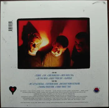 <u>PRESSING INFO</u><br><table class=inf_press><tbody><tr class=inf_info><td class=inf_title>Album:</td><td class=inf_info> Goddamnit Redux on Random Colour 'Clear Red with Smoke'  </td></tr>
    <td class=inf_title>Pressing:</td><td> Eighteenth Pressing V.2 /500  </td></tr>
    <td class=inf_title>Release Date:</td><td> Oct. 30th 2023  </td></tr>
    <td class=inf_title>Album Pressed:</td><td> 2022  </td></tr>
    <td class=inf_title>Label:</td><td> Asianman Records AM-160  </td></tr>
    <td class=inf_title>Insert:</td><td> Double Sided Glossy  </td></tr>
    <td class=inf_title>Barcode:</td><td> 6 12851-01601 9  </td></tr>
    <td class=inf_title>Side A Matrix:</td><td> [etched] AM-160-A S-65748 [stamped] GOLDEN  </td></tr>
    <td class=inf_title>Side B Matrix:</td><td> [etched] AM-160-B S-65749 [stamped] GOLDEN  </td></tr>
    <td class=inf_title>&nbsp;</td><td> <a href=https://www.discogs.com/release/22437724-Alkaline-Trio-Goddamnit target=_blank rel=noopener noreferrer>View This Release on Discogs</a>  </tr></tbody></table>
<br><u>PRICING</u><span class='less' style='padding-left: 8px; color: var(--font-colour_grey);'>(prices shown in USD)</span><br><table class='inf_press'><tbody><tr class='inf_info'>
            <td class='inf_title'>Last Sold:</td>
            <td>$25.00 (Jul 3, 2026)</td>
            </tr><tr class='inf_info'>
            <td class='inf_title'>History:</td>
            <td>
                <span class='price-low' title='Sold on Apr 27, 2023'>Low: <span class='price-value'>$14.99</span></span>
                <span class='price-separator'>|</span>
                <span class='price-avg'>Avg: <span class='price-value'>$21.07</span></span>
                <span class='price-separator'>|</span>
                <span class='price-high' title='Sold on Jan 26, 2025'>High: <span class='price-value'>$30.00</span></span>
            </td>
            </tr></tbody></table><br>    <br><br><u>TRACKLIST</u><br><table class='inf_tracks'><tbody><tr>
            <td class='inf_num'>A1</td>
            <td class='inf_trk'>Cringe</td>
            <td class='inf_len'>2:23</td>
            <td><a href='#' class='lyric-link' data-album-code='gd' data-song-title='Cringe'>Lyrics</a></td></tr><tr>
            <td class='inf_num'>A2</td>
            <td class='inf_trk'>Cop</td>
            <td class='inf_len'>2:18</td>
            <td><a href='#' class='lyric-link' data-album-code='gd' data-song-title='Cop'>Lyrics</a></td></tr><tr>
            <td class='inf_num'>A3</td>
            <td class='inf_trk'>San Francisco</td>
            <td class='inf_len'>3:52</td>
            <td><a href='#' class='lyric-link' data-album-code='gd' data-song-title='San Francisco'>Lyrics</a></td></tr><tr>
            <td class='inf_num'>A4</td>
            <td class='inf_trk'>Nose Over Tail</td>
            <td class='inf_len'>2:37</td>
            <td><a href='#' class='lyric-link' data-album-code='gd' data-song-title='Nose Over Tail'>Lyrics</a></td></tr><tr>
            <td class='inf_num'>A5</td>
            <td class='inf_trk'>As You Were</td>
            <td class='inf_len'>2:11</td>
            <td><a href='#' class='lyric-link' data-album-code='gd' data-song-title='As You Were'>Lyrics</a></td></tr><tr>
            <td class='inf_num'>A6</td>
            <td class='inf_trk'>Enjoy Your Day</td>
            <td class='inf_len'>2:17</td>
            <td><a href='#' class='lyric-link' data-album-code='gd' data-song-title='Enjoy Your Day'>Lyrics</a></td></tr><tr>
            <td class='inf_num'>A7</td>
            <td class='inf_trk'>Clavicle</td>
            <td class='inf_len'>2:28</td>
            <td><a href='#' class='lyric-link' data-album-code='gd' data-song-title='Clavicle'>Lyrics</a></td></tr><tr>
            <td class='inf_num'>B1</td>
            <td class='inf_trk'>My Little Needle</td>
            <td class='inf_len'>3:01</td>
            <td><a href='#' class='lyric-link' data-album-code='gd' data-song-title='My Little Needle'>Lyrics</a></td></tr><tr>
            <td class='inf_num'>B2</td>
            <td class='inf_trk'>Southern Rock</td>
            <td class='inf_len'>3:05</td>
            <td><a href='#' class='lyric-link' data-album-code='gd' data-song-title='Southern Rock'>Lyrics</a></td></tr><tr>
            <td class='inf_num'>B3</td>
            <td class='inf_trk'>Message From Kathlene</td>
            <td class='inf_len'>3:22</td>
            <td><a href='#' class='lyric-link' data-album-code='gd' data-song-title='Message From Kathlene'>Lyrics</a></td></tr><tr>
            <td class='inf_num'>B4</td>
            <td class='inf_trk'>Trouble Breathing</td>
            <td class='inf_len'>3:55</td>
            <td><a href='#' class='lyric-link' data-album-code='gd' data-song-title='Trouble Breathing'>Lyrics</a></td></tr><tr>
            <td class='inf_num'>B5</td>
            <td class='inf_trk'>Sorry About That</td>
            <td class='inf_len'>3:21</td>
            <td><a href='#' class='lyric-link' data-album-code='gd' data-song-title='Sorry About That'>Lyrics</a></td></tr></tbody></table><br><br>
    <u>NOTES</u><br> Released on 'Random Eco Vinyl' at Devil Dog Distro. According to Mike Park DD Distro received this in a box marked distro and are part of the earlier released 18th pressing.
 - Back