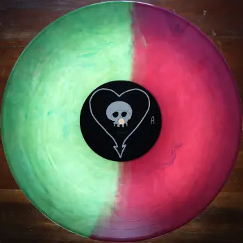 <u>PRESSING INFO</u><br><table class=inf_press><tbody><tr class=inf_info><td class=inf_title>Album:</td><td class=inf_info> Goddamnit Redux on Random Colour 'Half Translucent Green / Half Translucent Purple'  </td></tr>
    <td class=inf_title>Pressing:</td><td> Twenty-Second Pressing /1000  </td></tr>
    <td class=inf_title>Release Date:</td><td> May 13th 2024  </td></tr>
    <td class=inf_title>Album Pressed:</td><td> 2024  </td></tr>
    <td class=inf_title>Label:</td><td> Asianman Records AM-160  </td></tr>
    <td class=inf_title>Insert:</td><td> Double Sided Glossy  </td></tr>
    <td class=inf_title>Barcode:</td><td> 6 12851-01601 9  </td></tr>
    <td class=inf_title>Side A Matrix:</td><td> [etched] AM-160-A S-65748 [stamped] GOLDEN  </td></tr>
    <td class=inf_title>Side B Matrix:</td><td> [etched] AM-160-B S-65749 [stamped] GOLDEN  </td></tr>
    <td class=inf_title>&nbsp;</td><td> <a href=https://www.discogs.com/release/30789558-Alkaline-Trio-Goddamnit target=_blank rel=noopener noreferrer>View This Release on Discogs</a>  </tr></tbody></table>
<br><u>PRICING</u><span class='less' style='padding-left: 8px; color: var(--font-colour_grey);'>(prices shown in USD)</span><br><table class='inf_press'><tbody><tr class='inf_info'>
            <td class='inf_title'>Last Sold:</td>
            <td>$19.98 (Dec 25, 2025)</td>
            </tr><tr class='inf_info'>
            <td class='inf_title'>History:</td>
            <td>
                <span class='price-low' title='Sold on Dec 17, 2024'>Low: <span class='price-value'>$17.98</span></span>
                <span class='price-separator'>|</span>
                <span class='price-avg'>Avg: <span class='price-value'>$19.77</span></span>
                <span class='price-separator'>|</span>
                <span class='price-high' title='Sold on May 7, 2025'>High: <span class='price-value'>$22.00</span></span>
            </td>
            </tr></tbody></table><br>    <br><br><u>TRACKLIST</u><br><table class='inf_tracks'><tbody><tr>
            <td class='inf_num'>A1</td>
            <td class='inf_trk'>Cringe</td>
            <td class='inf_len'>2:23</td>
            <td><a href='#' class='lyric-link' data-album-code='gd' data-song-title='Cringe'>Lyrics</a></td></tr><tr>
            <td class='inf_num'>A2</td>
            <td class='inf_trk'>Cop</td>
            <td class='inf_len'>2:18</td>
            <td><a href='#' class='lyric-link' data-album-code='gd' data-song-title='Cop'>Lyrics</a></td></tr><tr>
            <td class='inf_num'>A3</td>
            <td class='inf_trk'>San Francisco</td>
            <td class='inf_len'>3:52</td>
            <td><a href='#' class='lyric-link' data-album-code='gd' data-song-title='San Francisco'>Lyrics</a></td></tr><tr>
            <td class='inf_num'>A4</td>
            <td class='inf_trk'>Nose Over Tail</td>
            <td class='inf_len'>2:37</td>
            <td><a href='#' class='lyric-link' data-album-code='gd' data-song-title='Nose Over Tail'>Lyrics</a></td></tr><tr>
            <td class='inf_num'>A5</td>
            <td class='inf_trk'>As You Were</td>
            <td class='inf_len'>2:11</td>
            <td><a href='#' class='lyric-link' data-album-code='gd' data-song-title='As You Were'>Lyrics</a></td></tr><tr>
            <td class='inf_num'>A6</td>
            <td class='inf_trk'>Enjoy Your Day</td>
            <td class='inf_len'>2:17</td>
            <td><a href='#' class='lyric-link' data-album-code='gd' data-song-title='Enjoy Your Day'>Lyrics</a></td></tr><tr>
            <td class='inf_num'>A7</td>
            <td class='inf_trk'>Clavicle</td>
            <td class='inf_len'>2:28</td>
            <td><a href='#' class='lyric-link' data-album-code='gd' data-song-title='Clavicle'>Lyrics</a></td></tr><tr>
            <td class='inf_num'>B1</td>
            <td class='inf_trk'>My Little Needle</td>
            <td class='inf_len'>3:01</td>
            <td><a href='#' class='lyric-link' data-album-code='gd' data-song-title='My Little Needle'>Lyrics</a></td></tr><tr>
            <td class='inf_num'>B2</td>
            <td class='inf_trk'>Southern Rock</td>
            <td class='inf_len'>3:05</td>
            <td><a href='#' class='lyric-link' data-album-code='gd' data-song-title='Southern Rock'>Lyrics</a></td></tr><tr>
            <td class='inf_num'>B3</td>
            <td class='inf_trk'>Message From Kathlene</td>
            <td class='inf_len'>3:22</td>
            <td><a href='#' class='lyric-link' data-album-code='gd' data-song-title='Message From Kathlene'>Lyrics</a></td></tr><tr>
            <td class='inf_num'>B4</td>
            <td class='inf_trk'>Trouble Breathing</td>
            <td class='inf_len'>3:55</td>
            <td><a href='#' class='lyric-link' data-album-code='gd' data-song-title='Trouble Breathing'>Lyrics</a></td></tr><tr>
            <td class='inf_num'>B5</td>
            <td class='inf_trk'>Sorry About That</td>
            <td class='inf_len'>3:21</td>
            <td><a href='#' class='lyric-link' data-album-code='gd' data-song-title='Sorry About That'>Lyrics</a></td></tr></tbody></table><br><br>
    <u>NOTES</u><br> Thin white border around insert. Former DVD order form is now covered by Heart/Skull logos. Center labels are black Heart/Skull logos.
 - A2