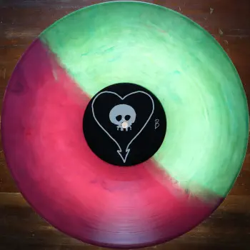 <u>PRESSING INFO</u><br><table class=inf_press><tbody><tr class=inf_info><td class=inf_title>Album:</td><td class=inf_info> Goddamnit Redux on Random Colour 'Half Translucent Green / Half Translucent Purple'  </td></tr>
    <td class=inf_title>Pressing:</td><td> Twenty-Second Pressing /1000  </td></tr>
    <td class=inf_title>Release Date:</td><td> May 13th 2024  </td></tr>
    <td class=inf_title>Album Pressed:</td><td> 2024  </td></tr>
    <td class=inf_title>Label:</td><td> Asianman Records AM-160  </td></tr>
    <td class=inf_title>Insert:</td><td> Double Sided Glossy  </td></tr>
    <td class=inf_title>Barcode:</td><td> 6 12851-01601 9  </td></tr>
    <td class=inf_title>Side A Matrix:</td><td> [etched] AM-160-A S-65748 [stamped] GOLDEN  </td></tr>
    <td class=inf_title>Side B Matrix:</td><td> [etched] AM-160-B S-65749 [stamped] GOLDEN  </td></tr>
    <td class=inf_title>&nbsp;</td><td> <a href=https://www.discogs.com/release/30789558-Alkaline-Trio-Goddamnit target=_blank rel=noopener noreferrer>View This Release on Discogs</a>  </tr></tbody></table>
<br><u>PRICING</u><span class='less' style='padding-left: 8px; color: var(--font-colour_grey);'>(prices shown in USD)</span><br><table class='inf_press'><tbody><tr class='inf_info'>
            <td class='inf_title'>Last Sold:</td>
            <td>$19.98 (Dec 25, 2025)</td>
            </tr><tr class='inf_info'>
            <td class='inf_title'>History:</td>
            <td>
                <span class='price-low' title='Sold on Dec 17, 2024'>Low: <span class='price-value'>$17.98</span></span>
                <span class='price-separator'>|</span>
                <span class='price-avg'>Avg: <span class='price-value'>$19.77</span></span>
                <span class='price-separator'>|</span>
                <span class='price-high' title='Sold on May 7, 2025'>High: <span class='price-value'>$22.00</span></span>
            </td>
            </tr></tbody></table><br>    <br><br><u>TRACKLIST</u><br><table class='inf_tracks'><tbody><tr>
            <td class='inf_num'>A1</td>
            <td class='inf_trk'>Cringe</td>
            <td class='inf_len'>2:23</td>
            <td><a href='#' class='lyric-link' data-album-code='gd' data-song-title='Cringe'>Lyrics</a></td></tr><tr>
            <td class='inf_num'>A2</td>
            <td class='inf_trk'>Cop</td>
            <td class='inf_len'>2:18</td>
            <td><a href='#' class='lyric-link' data-album-code='gd' data-song-title='Cop'>Lyrics</a></td></tr><tr>
            <td class='inf_num'>A3</td>
            <td class='inf_trk'>San Francisco</td>
            <td class='inf_len'>3:52</td>
            <td><a href='#' class='lyric-link' data-album-code='gd' data-song-title='San Francisco'>Lyrics</a></td></tr><tr>
            <td class='inf_num'>A4</td>
            <td class='inf_trk'>Nose Over Tail</td>
            <td class='inf_len'>2:37</td>
            <td><a href='#' class='lyric-link' data-album-code='gd' data-song-title='Nose Over Tail'>Lyrics</a></td></tr><tr>
            <td class='inf_num'>A5</td>
            <td class='inf_trk'>As You Were</td>
            <td class='inf_len'>2:11</td>
            <td><a href='#' class='lyric-link' data-album-code='gd' data-song-title='As You Were'>Lyrics</a></td></tr><tr>
            <td class='inf_num'>A6</td>
            <td class='inf_trk'>Enjoy Your Day</td>
            <td class='inf_len'>2:17</td>
            <td><a href='#' class='lyric-link' data-album-code='gd' data-song-title='Enjoy Your Day'>Lyrics</a></td></tr><tr>
            <td class='inf_num'>A7</td>
            <td class='inf_trk'>Clavicle</td>
            <td class='inf_len'>2:28</td>
            <td><a href='#' class='lyric-link' data-album-code='gd' data-song-title='Clavicle'>Lyrics</a></td></tr><tr>
            <td class='inf_num'>B1</td>
            <td class='inf_trk'>My Little Needle</td>
            <td class='inf_len'>3:01</td>
            <td><a href='#' class='lyric-link' data-album-code='gd' data-song-title='My Little Needle'>Lyrics</a></td></tr><tr>
            <td class='inf_num'>B2</td>
            <td class='inf_trk'>Southern Rock</td>
            <td class='inf_len'>3:05</td>
            <td><a href='#' class='lyric-link' data-album-code='gd' data-song-title='Southern Rock'>Lyrics</a></td></tr><tr>
            <td class='inf_num'>B3</td>
            <td class='inf_trk'>Message From Kathlene</td>
            <td class='inf_len'>3:22</td>
            <td><a href='#' class='lyric-link' data-album-code='gd' data-song-title='Message From Kathlene'>Lyrics</a></td></tr><tr>
            <td class='inf_num'>B4</td>
            <td class='inf_trk'>Trouble Breathing</td>
            <td class='inf_len'>3:55</td>
            <td><a href='#' class='lyric-link' data-album-code='gd' data-song-title='Trouble Breathing'>Lyrics</a></td></tr><tr>
            <td class='inf_num'>B5</td>
            <td class='inf_trk'>Sorry About That</td>
            <td class='inf_len'>3:21</td>
            <td><a href='#' class='lyric-link' data-album-code='gd' data-song-title='Sorry About That'>Lyrics</a></td></tr></tbody></table><br><br>
    <u>NOTES</u><br> Thin white border around insert. Former DVD order form is now covered by Heart/Skull logos. Center labels are black Heart/Skull logos.
 - B2