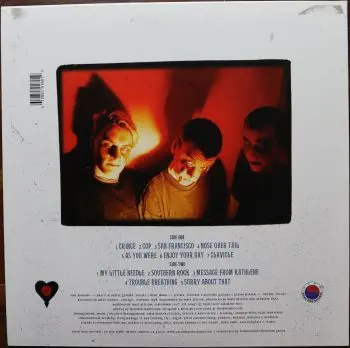 <u>PRESSING INFO</u><br><table class=inf_press><tbody><tr class=inf_info><td class=inf_title>Album:</td><td class=inf_info> Goddamnit Redux on Random Colour 'Green with Rainbow Flecks' (Retail Exclusive)  </td></tr>
    <td class=inf_title>Pressing:</td><td> Eighteenth Pressing /500  </td></tr>
    <td class=inf_title>Release Date:</td><td> Mar. 1st 2022  </td></tr>
    <td class=inf_title>Album Pressed:</td><td> 2022  </td></tr>
    <td class=inf_title>Label:</td><td> Asianman Records AM-160  </td></tr>
    <td class=inf_title>Insert:</td><td> Double Sided Glossy  </td></tr>
    <td class=inf_title>Barcode:</td><td> 6 12851-01601 9  </td></tr>
    <td class=inf_title>Side A Matrix:</td><td> [etched] AM-160-A S-65748 [stamped] GOLDEN  </td></tr>
    <td class=inf_title>Side B Matrix:</td><td> [etched] AM-160-B S-65749 [stamped] GOLDEN  </td></tr>
    <td class=inf_title>&nbsp;</td><td> <a href=https://www.discogs.com/release/22437724-Alkaline-Trio-Goddamnit target=_blank rel=noopener noreferrer>View This Release on Discogs</a>  </tr></tbody></table>
<br><u>PRICING</u><span class='less' style='padding-left: 8px; color: var(--font-colour_grey);'>(prices shown in USD)</span><br><table class='inf_press'><tbody><tr class='inf_info'>
            <td class='inf_title'>Last Sold:</td>
            <td>$25.00 (Jul 3, 2026)</td>
            </tr><tr class='inf_info'>
            <td class='inf_title'>History:</td>
            <td>
                <span class='price-low' title='Sold on Apr 27, 2023'>Low: <span class='price-value'>$14.99</span></span>
                <span class='price-separator'>|</span>
                <span class='price-avg'>Avg: <span class='price-value'>$21.07</span></span>
                <span class='price-separator'>|</span>
                <span class='price-high' title='Sold on Jan 26, 2025'>High: <span class='price-value'>$30.00</span></span>
            </td>
            </tr></tbody></table><br>    <br><br><u>TRACKLIST</u><br><table class='inf_tracks'><tbody><tr>
            <td class='inf_num'>A1</td>
            <td class='inf_trk'>Cringe</td>
            <td class='inf_len'>2:23</td>
            <td><a href='#' class='lyric-link' data-album-code='gd' data-song-title='Cringe'>Lyrics</a></td></tr><tr>
            <td class='inf_num'>A2</td>
            <td class='inf_trk'>Cop</td>
            <td class='inf_len'>2:18</td>
            <td><a href='#' class='lyric-link' data-album-code='gd' data-song-title='Cop'>Lyrics</a></td></tr><tr>
            <td class='inf_num'>A3</td>
            <td class='inf_trk'>San Francisco</td>
            <td class='inf_len'>3:52</td>
            <td><a href='#' class='lyric-link' data-album-code='gd' data-song-title='San Francisco'>Lyrics</a></td></tr><tr>
            <td class='inf_num'>A4</td>
            <td class='inf_trk'>Nose Over Tail</td>
            <td class='inf_len'>2:37</td>
            <td><a href='#' class='lyric-link' data-album-code='gd' data-song-title='Nose Over Tail'>Lyrics</a></td></tr><tr>
            <td class='inf_num'>A5</td>
            <td class='inf_trk'>As You Were</td>
            <td class='inf_len'>2:11</td>
            <td><a href='#' class='lyric-link' data-album-code='gd' data-song-title='As You Were'>Lyrics</a></td></tr><tr>
            <td class='inf_num'>A6</td>
            <td class='inf_trk'>Enjoy Your Day</td>
            <td class='inf_len'>2:17</td>
            <td><a href='#' class='lyric-link' data-album-code='gd' data-song-title='Enjoy Your Day'>Lyrics</a></td></tr><tr>
            <td class='inf_num'>A7</td>
            <td class='inf_trk'>Clavicle</td>
            <td class='inf_len'>2:28</td>
            <td><a href='#' class='lyric-link' data-album-code='gd' data-song-title='Clavicle'>Lyrics</a></td></tr><tr>
            <td class='inf_num'>B1</td>
            <td class='inf_trk'>My Little Needle</td>
            <td class='inf_len'>3:01</td>
            <td><a href='#' class='lyric-link' data-album-code='gd' data-song-title='My Little Needle'>Lyrics</a></td></tr><tr>
            <td class='inf_num'>B2</td>
            <td class='inf_trk'>Southern Rock</td>
            <td class='inf_len'>3:05</td>
            <td><a href='#' class='lyric-link' data-album-code='gd' data-song-title='Southern Rock'>Lyrics</a></td></tr><tr>
            <td class='inf_num'>B3</td>
            <td class='inf_trk'>Message From Kathlene</td>
            <td class='inf_len'>3:22</td>
            <td><a href='#' class='lyric-link' data-album-code='gd' data-song-title='Message From Kathlene'>Lyrics</a></td></tr><tr>
            <td class='inf_num'>B4</td>
            <td class='inf_trk'>Trouble Breathing</td>
            <td class='inf_len'>3:55</td>
            <td><a href='#' class='lyric-link' data-album-code='gd' data-song-title='Trouble Breathing'>Lyrics</a></td></tr><tr>
            <td class='inf_num'>B5</td>
            <td class='inf_trk'>Sorry About That</td>
            <td class='inf_len'>3:21</td>
            <td><a href='#' class='lyric-link' data-album-code='gd' data-song-title='Sorry About That'>Lyrics</a></td></tr></tbody></table><br><br>
    <u>NOTES</u><br> Thin white border around insert. Former DVD order form is now covered by Heart/Skull logos. Center labels are black Heart/Skull logos. The sleeve of this release has a flat finish, compared to previous pressings that had glossy features.
 - Back