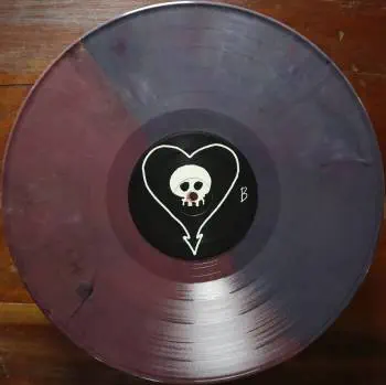 <u>PRESSING INFO</u><br><table class=inf_press><tbody><tr class=inf_info><td class=inf_title>Album:</td><td class=inf_info> Goddamnit Redux on Random Colour 'Half Purple / Half Plum'  </td></tr>
    <td class=inf_title>Pressing:</td><td> Sixteenth Pressing /1000  </td></tr>
    <td class=inf_title>Release Date:</td><td> Feb. 15th 2021  </td></tr>
    <td class=inf_title>Album Pressed:</td><td> 2021  </td></tr>
    <td class=inf_title>Label:</td><td> Asianman Records AM-160  </td></tr>
    <td class=inf_title>Insert:</td><td> Double Sided Glossy  </td></tr>
    <td class=inf_title>Barcode:</td><td> 6 12851-01601 9  </td></tr>
    <td class=inf_title>Side A Matrix:</td><td> [etched] AM-160-A S-65748 [stamped] GOLDEN  </td></tr>
    <td class=inf_title>Side B Matrix:</td><td> [etched] AM-160-B S-65749 [stamped] GOLDEN  </td></tr>
    <td class=inf_title>&nbsp;</td><td> <a href=https://www.discogs.com/release/17544028-Alkaline-Trio-Goddamnit target=_blank rel=noopener noreferrer>View This Release on Discogs</a>  </tr></tbody></table>
<br><u>PRICING</u><span class='less' style='padding-left: 8px; color: var(--font-colour_grey);'>(prices shown in USD)</span><br><table class='inf_press'><tbody><tr class='inf_info'>
            <td class='inf_title'>Last Sold:</td>
            <td>$33.15 (Feb 7, 2025)</td>
            </tr><tr class='inf_info'>
            <td class='inf_title'>History:</td>
            <td>
                <span class='price-low' title='Sold on Aug 29, 2021'>Low: <span class='price-value'>$15.00</span></span>
                <span class='price-separator'>|</span>
                <span class='price-avg'>Avg: <span class='price-value'>$29.77</span></span>
                <span class='price-separator'>|</span>
                <span class='price-high' title='Sold on Jun 17, 2021'>High: <span class='price-value'>$39.99</span></span>
            </td>
            </tr></tbody></table><br>    <br><br><u>TRACKLIST</u><br><table class='inf_tracks'><tbody><tr>
            <td class='inf_num'>A1</td>
            <td class='inf_trk'>Cringe</td>
            <td class='inf_len'>2:23</td>
            <td><a href='#' class='lyric-link' data-album-code='gd' data-song-title='Cringe'>Lyrics</a></td></tr><tr>
            <td class='inf_num'>A2</td>
            <td class='inf_trk'>Cop</td>
            <td class='inf_len'>2:18</td>
            <td><a href='#' class='lyric-link' data-album-code='gd' data-song-title='Cop'>Lyrics</a></td></tr><tr>
            <td class='inf_num'>A3</td>
            <td class='inf_trk'>San Francisco</td>
            <td class='inf_len'>3:52</td>
            <td><a href='#' class='lyric-link' data-album-code='gd' data-song-title='San Francisco'>Lyrics</a></td></tr><tr>
            <td class='inf_num'>A4</td>
            <td class='inf_trk'>Nose Over Tail</td>
            <td class='inf_len'>2:37</td>
            <td><a href='#' class='lyric-link' data-album-code='gd' data-song-title='Nose Over Tail'>Lyrics</a></td></tr><tr>
            <td class='inf_num'>A5</td>
            <td class='inf_trk'>As You Were</td>
            <td class='inf_len'>2:11</td>
            <td><a href='#' class='lyric-link' data-album-code='gd' data-song-title='As You Were'>Lyrics</a></td></tr><tr>
            <td class='inf_num'>A6</td>
            <td class='inf_trk'>Enjoy Your Day</td>
            <td class='inf_len'>2:17</td>
            <td><a href='#' class='lyric-link' data-album-code='gd' data-song-title='Enjoy Your Day'>Lyrics</a></td></tr><tr>
            <td class='inf_num'>A7</td>
            <td class='inf_trk'>Clavicle</td>
            <td class='inf_len'>2:28</td>
            <td><a href='#' class='lyric-link' data-album-code='gd' data-song-title='Clavicle'>Lyrics</a></td></tr><tr>
            <td class='inf_num'>B1</td>
            <td class='inf_trk'>My Little Needle</td>
            <td class='inf_len'>3:01</td>
            <td><a href='#' class='lyric-link' data-album-code='gd' data-song-title='My Little Needle'>Lyrics</a></td></tr><tr>
            <td class='inf_num'>B2</td>
            <td class='inf_trk'>Southern Rock</td>
            <td class='inf_len'>3:05</td>
            <td><a href='#' class='lyric-link' data-album-code='gd' data-song-title='Southern Rock'>Lyrics</a></td></tr><tr>
            <td class='inf_num'>B3</td>
            <td class='inf_trk'>Message From Kathlene</td>
            <td class='inf_len'>3:22</td>
            <td><a href='#' class='lyric-link' data-album-code='gd' data-song-title='Message From Kathlene'>Lyrics</a></td></tr><tr>
            <td class='inf_num'>B4</td>
            <td class='inf_trk'>Trouble Breathing</td>
            <td class='inf_len'>3:55</td>
            <td><a href='#' class='lyric-link' data-album-code='gd' data-song-title='Trouble Breathing'>Lyrics</a></td></tr><tr>
            <td class='inf_num'>B5</td>
            <td class='inf_trk'>Sorry About That</td>
            <td class='inf_len'>3:21</td>
            <td><a href='#' class='lyric-link' data-album-code='gd' data-song-title='Sorry About That'>Lyrics</a></td></tr></tbody></table><br><br>
    <u>NOTES</u><br> Thin white border around insert. Former DVD order form is now covered by Heart/Skull logos. Center labels are black Heart/Skull logos. The sleeve of this release has a flat finish, compared to previous pressings that had glossy features.
 - B
