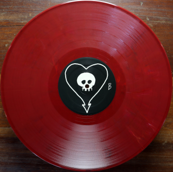 <u>PRESSING INFO</u><br><table class=inf_press><tbody><tr class=inf_info><td class=inf_title>Album:</td><td class=inf_info> Goddamnit Redux on Random Colour 'Red Marble'  </td></tr>
    <td class=inf_title>Pressing:</td><td> Twenty-Third Pressing /500  </td></tr>
    <td class=inf_title>Release Date:</td><td> Jan. 24th 2026  </td></tr>
    <td class=inf_title>Album Pressed:</td><td> 2026  </td></tr>
    <td class=inf_title>Label:</td><td> Asianman Records AM-160  </td></tr>
    <td class=inf_title>Insert:</td><td> Double Sided Glossy  </td></tr>
    <td class=inf_title>Barcode:</td><td> 6 12851-01601 9  </td></tr>
    <td class=inf_title>Side A Matrix:</td><td> [etched] AM-160-A S-65748 [stamped] GOLDEN  </td></tr>
    <td class=inf_title>Side B Matrix:</td><td> [etched] AM-160-B S-65749 [stamped] GOLDEN  </td></tr>
    <td class=inf_title>&nbsp;</td><td> <a href=https://www.discogs.com/release/36435574-Alkaline-Trio-Goddamnit target=_blank rel=noopener noreferrer>View This Release on Discogs</a>  </tr></tbody></table>
<br><u>PRICING</u><span class='less' style='padding-left: 8px; color: var(--font-colour_grey);'>(prices shown in USD)</span><br><table class='inf_press'><tbody><tr class='inf_info'>
            <td class='inf_title'>Last Sold:</td>
            <td>$20.00 (Apr 13, 2026)</td>
            </tr><tr class='inf_info'>
            <td class='inf_title'>History:</td>
            <td>
                <span class='price-low' title='Sold on Apr 13, 2026'>Low: <span class='price-value'>$20.00</span></span>
                <span class='price-separator'>|</span>
                <span class='price-avg'>Avg: <span class='price-value'>$20.00</span></span>
                <span class='price-separator'>|</span>
                <span class='price-high' title='Sold on Apr 13, 2026'>High: <span class='price-value'>$20.00</span></span>
            </td>
            </tr></tbody></table><br>    <br><br><u>TRACKLIST</u><br><table class='inf_tracks'><tbody><tr>
            <td class='inf_num'>A1</td>
            <td class='inf_trk'>Cringe</td>
            <td class='inf_len'>2:23</td>
            <td><a href='#' class='lyric-link' data-album-code='gd' data-song-title='Cringe'>Lyrics</a></td></tr><tr>
            <td class='inf_num'>A2</td>
            <td class='inf_trk'>Cop</td>
            <td class='inf_len'>2:18</td>
            <td><a href='#' class='lyric-link' data-album-code='gd' data-song-title='Cop'>Lyrics</a></td></tr><tr>
            <td class='inf_num'>A3</td>
            <td class='inf_trk'>San Francisco</td>
            <td class='inf_len'>3:52</td>
            <td><a href='#' class='lyric-link' data-album-code='gd' data-song-title='San Francisco'>Lyrics</a></td></tr><tr>
            <td class='inf_num'>A4</td>
            <td class='inf_trk'>Nose Over Tail</td>
            <td class='inf_len'>2:37</td>
            <td><a href='#' class='lyric-link' data-album-code='gd' data-song-title='Nose Over Tail'>Lyrics</a></td></tr><tr>
            <td class='inf_num'>A5</td>
            <td class='inf_trk'>As You Were</td>
            <td class='inf_len'>2:11</td>
            <td><a href='#' class='lyric-link' data-album-code='gd' data-song-title='As You Were'>Lyrics</a></td></tr><tr>
            <td class='inf_num'>A6</td>
            <td class='inf_trk'>Enjoy Your Day</td>
            <td class='inf_len'>2:17</td>
            <td><a href='#' class='lyric-link' data-album-code='gd' data-song-title='Enjoy Your Day'>Lyrics</a></td></tr><tr>
            <td class='inf_num'>A7</td>
            <td class='inf_trk'>Clavicle</td>
            <td class='inf_len'>2:28</td>
            <td><a href='#' class='lyric-link' data-album-code='gd' data-song-title='Clavicle'>Lyrics</a></td></tr><tr>
            <td class='inf_num'>B1</td>
            <td class='inf_trk'>My Little Needle</td>
            <td class='inf_len'>3:01</td>
            <td><a href='#' class='lyric-link' data-album-code='gd' data-song-title='My Little Needle'>Lyrics</a></td></tr><tr>
            <td class='inf_num'>B2</td>
            <td class='inf_trk'>Southern Rock</td>
            <td class='inf_len'>3:05</td>
            <td><a href='#' class='lyric-link' data-album-code='gd' data-song-title='Southern Rock'>Lyrics</a></td></tr><tr>
            <td class='inf_num'>B3</td>
            <td class='inf_trk'>Message From Kathlene</td>
            <td class='inf_len'>3:22</td>
            <td><a href='#' class='lyric-link' data-album-code='gd' data-song-title='Message From Kathlene'>Lyrics</a></td></tr><tr>
            <td class='inf_num'>B4</td>
            <td class='inf_trk'>Trouble Breathing</td>
            <td class='inf_len'>3:55</td>
            <td><a href='#' class='lyric-link' data-album-code='gd' data-song-title='Trouble Breathing'>Lyrics</a></td></tr><tr>
            <td class='inf_num'>B5</td>
            <td class='inf_trk'>Sorry About That</td>
            <td class='inf_len'>3:21</td>
            <td><a href='#' class='lyric-link' data-album-code='gd' data-song-title='Sorry About That'>Lyrics</a></td></tr></tbody></table><br><br>
    <u>NOTES</u><br> Thin white border around insert. Former DVD order form is now covered by Heart/Skull logos. Center labels are black Heart/Skull logos.
 - B