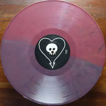 <u>PRESSING INFO</u><br><table class=inf_press><tbody><tr class=inf_info><td class=inf_title>Album:</td><td class=inf_info> Goddamnit Redux on Random Colour 'Half Red / Half Plum'  </td></tr>
    <td class=inf_title>Pressing:</td><td> Sixteenth Pressing /1000  </td></tr>
    <td class=inf_title>Release Date:</td><td> Feb. 15th 2021  </td></tr>
    <td class=inf_title>Album Pressed:</td><td> 2021  </td></tr>
    <td class=inf_title>Label:</td><td> Asianman Records AM-160  </td></tr>
    <td class=inf_title>Insert:</td><td> Double Sided Glossy  </td></tr>
    <td class=inf_title>Barcode:</td><td> 6 12851-01601 9  </td></tr>
    <td class=inf_title>Side A Matrix:</td><td> [etched] AM-160-A S-65748 [stamped] GOLDEN  </td></tr>
    <td class=inf_title>Side B Matrix:</td><td> [etched] AM-160-B S-65749 [stamped] GOLDEN  </td></tr>
    <td class=inf_title>&nbsp;</td><td> <a href=https://www.discogs.com/release/17544028-Alkaline-Trio-Goddamnit target=_blank rel=noopener noreferrer>View This Release on Discogs</a>  </tr></tbody></table>
<br><u>PRICING</u><span class='less' style='padding-left: 8px; color: var(--font-colour_grey);'>(prices shown in USD)</span><br><table class='inf_press'><tbody><tr class='inf_info'>
            <td class='inf_title'>Last Sold:</td>
            <td>$33.15 (Feb 7, 2025)</td>
            </tr><tr class='inf_info'>
            <td class='inf_title'>History:</td>
            <td>
                <span class='price-low' title='Sold on Aug 29, 2021'>Low: <span class='price-value'>$15.00</span></span>
                <span class='price-separator'>|</span>
                <span class='price-avg'>Avg: <span class='price-value'>$29.77</span></span>
                <span class='price-separator'>|</span>
                <span class='price-high' title='Sold on Jun 17, 2021'>High: <span class='price-value'>$39.99</span></span>
            </td>
            </tr></tbody></table><br>    <br><br><u>TRACKLIST</u><br><table class='inf_tracks'><tbody><tr>
            <td class='inf_num'>A1</td>
            <td class='inf_trk'>Cringe</td>
            <td class='inf_len'>2:23</td>
            <td><a href='#' class='lyric-link' data-album-code='gd' data-song-title='Cringe'>Lyrics</a></td></tr><tr>
            <td class='inf_num'>A2</td>
            <td class='inf_trk'>Cop</td>
            <td class='inf_len'>2:18</td>
            <td><a href='#' class='lyric-link' data-album-code='gd' data-song-title='Cop'>Lyrics</a></td></tr><tr>
            <td class='inf_num'>A3</td>
            <td class='inf_trk'>San Francisco</td>
            <td class='inf_len'>3:52</td>
            <td><a href='#' class='lyric-link' data-album-code='gd' data-song-title='San Francisco'>Lyrics</a></td></tr><tr>
            <td class='inf_num'>A4</td>
            <td class='inf_trk'>Nose Over Tail</td>
            <td class='inf_len'>2:37</td>
            <td><a href='#' class='lyric-link' data-album-code='gd' data-song-title='Nose Over Tail'>Lyrics</a></td></tr><tr>
            <td class='inf_num'>A5</td>
            <td class='inf_trk'>As You Were</td>
            <td class='inf_len'>2:11</td>
            <td><a href='#' class='lyric-link' data-album-code='gd' data-song-title='As You Were'>Lyrics</a></td></tr><tr>
            <td class='inf_num'>A6</td>
            <td class='inf_trk'>Enjoy Your Day</td>
            <td class='inf_len'>2:17</td>
            <td><a href='#' class='lyric-link' data-album-code='gd' data-song-title='Enjoy Your Day'>Lyrics</a></td></tr><tr>
            <td class='inf_num'>A7</td>
            <td class='inf_trk'>Clavicle</td>
            <td class='inf_len'>2:28</td>
            <td><a href='#' class='lyric-link' data-album-code='gd' data-song-title='Clavicle'>Lyrics</a></td></tr><tr>
            <td class='inf_num'>B1</td>
            <td class='inf_trk'>My Little Needle</td>
            <td class='inf_len'>3:01</td>
            <td><a href='#' class='lyric-link' data-album-code='gd' data-song-title='My Little Needle'>Lyrics</a></td></tr><tr>
            <td class='inf_num'>B2</td>
            <td class='inf_trk'>Southern Rock</td>
            <td class='inf_len'>3:05</td>
            <td><a href='#' class='lyric-link' data-album-code='gd' data-song-title='Southern Rock'>Lyrics</a></td></tr><tr>
            <td class='inf_num'>B3</td>
            <td class='inf_trk'>Message From Kathlene</td>
            <td class='inf_len'>3:22</td>
            <td><a href='#' class='lyric-link' data-album-code='gd' data-song-title='Message From Kathlene'>Lyrics</a></td></tr><tr>
            <td class='inf_num'>B4</td>
            <td class='inf_trk'>Trouble Breathing</td>
            <td class='inf_len'>3:55</td>
            <td><a href='#' class='lyric-link' data-album-code='gd' data-song-title='Trouble Breathing'>Lyrics</a></td></tr><tr>
            <td class='inf_num'>B5</td>
            <td class='inf_trk'>Sorry About That</td>
            <td class='inf_len'>3:21</td>
            <td><a href='#' class='lyric-link' data-album-code='gd' data-song-title='Sorry About That'>Lyrics</a></td></tr></tbody></table><br><br>
    <u>NOTES</u><br> Thin white border around insert. Former DVD order form is now covered by Heart/Skull logos. Center labels are black Heart/Skull logos. The sleeve of this release has a flat finish, compared to previous pressings that had glossy features.
 - B