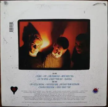 <u>PRESSING INFO</u><br><table class=inf_press><tbody><tr class=inf_info><td class=inf_title>Album:</td><td class=inf_info> Goddamnit Redux on Half Black / Half Red  </td></tr>
    <td class=inf_title>Pressing:</td><td> First Pressing /500  </td></tr>
    <td class=inf_title>Release Date:</td><td> Mar. 11th 2008  </td></tr>
    <td class=inf_title>Album Pressed:</td><td> 2008  </td></tr>
    <td class=inf_title>Label:</td><td> Asianman Records AM-160  </td></tr>
    <td class=inf_title>Insert:</td><td> Double Sided Glossy  </td></tr>
    <td class=inf_title>Barcode:</td><td> 6 12851-01601 9  </td></tr>
    <td class=inf_title>Side A Matrix:</td><td> 74940E1/B GOD  </td></tr>
    <td class=inf_title>Side B Matrix:</td><td> 74940E2/A DAMNIT!  </td></tr>
    <td class=inf_title>&nbsp;</td><td> <a href=https://www.discogs.com/release/1584606-Alkaline-Trio-Goddamnit target=_blank rel=noopener noreferrer>View This Release on Discogs</a>  </tr></tbody></table>
<br><u>PRICING</u><span class='less' style='padding-left: 8px; color: var(--font-colour_grey);'>(prices shown in USD)</span><br><table class='inf_press'><tbody><tr class='inf_info'>
            <td class='inf_title'>Last Sold:</td>
            <td>$49.99 (Mar 24, 2025)</td>
            </tr><tr class='inf_info'>
            <td class='inf_title'>History:</td>
            <td>
                <span class='price-low' title='Sold on Jan 30, 2017'>Low: <span class='price-value'>$15.00</span></span>
                <span class='price-separator'>|</span>
                <span class='price-avg'>Avg: <span class='price-value'>$34.98</span></span>
                <span class='price-separator'>|</span>
                <span class='price-high' title='Sold on Aug 30, 2023'>High: <span class='price-value'>$89.00</span></span>
            </td>
            </tr></tbody></table><br>    <br><br><u>TRACKLIST</u><br><table class='inf_tracks'><tbody><tr>
            <td class='inf_num'>A1</td>
            <td class='inf_trk'>Cringe</td>
            <td class='inf_len'>2:23</td>
            <td><a href='#' class='lyric-link' data-album-code='gd' data-song-title='Cringe'>Lyrics</a></td></tr><tr>
            <td class='inf_num'>A2</td>
            <td class='inf_trk'>Cop</td>
            <td class='inf_len'>2:18</td>
            <td><a href='#' class='lyric-link' data-album-code='gd' data-song-title='Cop'>Lyrics</a></td></tr><tr>
            <td class='inf_num'>A3</td>
            <td class='inf_trk'>San Francisco</td>
            <td class='inf_len'>3:52</td>
            <td><a href='#' class='lyric-link' data-album-code='gd' data-song-title='San Francisco'>Lyrics</a></td></tr><tr>
            <td class='inf_num'>A4</td>
            <td class='inf_trk'>Nose Over Tail</td>
            <td class='inf_len'>2:37</td>
            <td><a href='#' class='lyric-link' data-album-code='gd' data-song-title='Nose Over Tail'>Lyrics</a></td></tr><tr>
            <td class='inf_num'>A5</td>
            <td class='inf_trk'>As You Were</td>
            <td class='inf_len'>2:11</td>
            <td><a href='#' class='lyric-link' data-album-code='gd' data-song-title='As You Were'>Lyrics</a></td></tr><tr>
            <td class='inf_num'>A6</td>
            <td class='inf_trk'>Enjoy Your Day</td>
            <td class='inf_len'>2:17</td>
            <td><a href='#' class='lyric-link' data-album-code='gd' data-song-title='Enjoy Your Day'>Lyrics</a></td></tr><tr>
            <td class='inf_num'>A7</td>
            <td class='inf_trk'>Clavicle</td>
            <td class='inf_len'>2:28</td>
            <td><a href='#' class='lyric-link' data-album-code='gd' data-song-title='Clavicle'>Lyrics</a></td></tr><tr>
            <td class='inf_num'>B1</td>
            <td class='inf_trk'>My Little Needle</td>
            <td class='inf_len'>3:01</td>
            <td><a href='#' class='lyric-link' data-album-code='gd' data-song-title='My Little Needle'>Lyrics</a></td></tr><tr>
            <td class='inf_num'>B2</td>
            <td class='inf_trk'>Southern Rock</td>
            <td class='inf_len'>3:05</td>
            <td><a href='#' class='lyric-link' data-album-code='gd' data-song-title='Southern Rock'>Lyrics</a></td></tr><tr>
            <td class='inf_num'>B3</td>
            <td class='inf_trk'>Message From Kathlene</td>
            <td class='inf_len'>3:22</td>
            <td><a href='#' class='lyric-link' data-album-code='gd' data-song-title='Message From Kathlene'>Lyrics</a></td></tr><tr>
            <td class='inf_num'>B4</td>
            <td class='inf_trk'>Trouble Breathing</td>
            <td class='inf_len'>3:55</td>
            <td><a href='#' class='lyric-link' data-album-code='gd' data-song-title='Trouble Breathing'>Lyrics</a></td></tr><tr>
            <td class='inf_num'>B5</td>
            <td class='inf_trk'>Sorry About That</td>
            <td class='inf_len'>3:21</td>
            <td><a href='#' class='lyric-link' data-album-code='gd' data-song-title='Sorry About That'>Lyrics</a></td></tr></tbody></table><br><br>
    <u>NOTES</u><br> This 1st pressing has a matte cover but the lettering and clocks on the front, as well as the track titles and Heart & Skull logo on the back, have a glossy finish.
 - Back