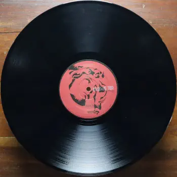 <u>PRESSING INFO</u><br><table class=inf_press><tbody><tr class=inf_info><td class=inf_title>Album:</td><td class=inf_info> Good Mourning on US Black  </td></tr>
    <td class=inf_title>Pressing:</td><td> First Pressing /??  </td></tr>
    <td class=inf_title>Release Date:</td><td> May 13th 2003  </td></tr>
    <td class=inf_title>Album Pressed:</td><td> 2003  </td></tr>
    <td class=inf_title>Label:</td><td> Vagrant Records - VR381  </td></tr>
    <td class=inf_title>Insert:</td><td> Double Sided Glossy  </td></tr>
    <td class=inf_title>Barcode:</td><td> 6 01091-03811 0  </td></tr>
    <td class=inf_title>Side A Matrix:</td><td> VR-Ø381-A 20:30 SRM 2  </td></tr>
    <td class=inf_title>Side B Matrix:</td><td> VR-0381-B 18:41 SRM 2  </td></tr>
    <td class=inf_title>&nbsp;</td><td> <a href=https://www.discogs.com/release/1983754 target=_blank rel=noopener noreferrer>View This Release on Discogs</a>  </tr></tbody></table>
<br><u>PRICING</u><span class='less' style='padding-left: 8px; color: var(--font-colour_grey);'>(prices shown in USD)</span><br><table class='inf_press'><tbody><tr class='inf_info'>
            <td class='inf_title'>Last Sold:</td>
            <td><span title='Sold for €115.00'>$130.97</span> (Apr 20, 2026)</td>
            </tr><tr class='inf_info'>
            <td class='inf_title'>History:</td>
            <td>
                <span class='price-low' title='Sold on Nov 19, 2021'>Low: <span class='price-value'>$49.99</span></span>
                <span class='price-separator'>|</span>
                <span class='price-avg'>Avg: <span class='price-value'>$129.76</span></span>
                <span class='price-separator'>|</span>
                <span class='price-high' title='€199.99 · Sold on Mar 10, 2023'>High: <span class='price-value'>$227.77</span></span>
            </td>
            </tr></tbody></table><br>    <br><br><u>TRACKLIST</u><br><table class='inf_tracks'><tbody><tr>
            <td class='inf_num'>A1</td>
            <td class='inf_trk'>This Could Be Love (For Fire)</td>
            <td class='inf_len'>3:47</td>
            <td><a href='#' class='lyric-link' data-album-code='gm' data-song-title='This Could Be Love (For Fire)'>Lyrics</a></td></tr><tr>
            <td class='inf_num'>A2</td>
            <td class='inf_trk'>We’ve Had Enough</td>
            <td class='inf_len'>2:51</td>
            <td><a href='#' class='lyric-link' data-album-code='gm' data-song-title='We’ve Had Enough'>Lyrics</a></td></tr><tr>
            <td class='inf_num'>A3</td>
            <td class='inf_trk'>One Hundred Stories</td>
            <td class='inf_len'>3:40</td>
            <td><a href='#' class='lyric-link' data-album-code='gm' data-song-title='One Hundred Stories'>Lyrics</a></td></tr><tr>
            <td class='inf_num'>A4</td>
            <td class='inf_trk'>Continental</td>
            <td class='inf_len'>3:28</td>
            <td><a href='#' class='lyric-link' data-album-code='gm' data-song-title='Continental'>Lyrics</a></td></tr><tr>
            <td class='inf_num'>A5</td>
            <td class='inf_trk'>All On Black</td>
            <td class='inf_len'>4:00</td>
            <td><a href='#' class='lyric-link' data-album-code='gm' data-song-title='All On Black'>Lyrics</a></td></tr><tr>
            <td class='inf_num'>A6</td>
            <td class='inf_trk'>Emma</td>
            <td class='inf_len'>2:42</td>
            <td><a href='#' class='lyric-link' data-album-code='gm' data-song-title='Emma'>Lyrics</a></td></tr><tr>
            <td class='inf_num'>B1</td>
            <td class='inf_trk'>Fatally Yours</td>
            <td class='inf_len'>2:16</td>
            <td><a href='#' class='lyric-link' data-album-code='gm' data-song-title='Fatally Yours'>Lyrics</a></td></tr><tr>
            <td class='inf_num'>B2</td>
            <td class='inf_trk'>Every Thug Needs A Lady</td>
            <td class='inf_len'>3:18</td>
            <td><a href='#' class='lyric-link' data-album-code='gm' data-song-title='Every Thug Needs A Lady'>Lyrics</a></td></tr><tr>
            <td class='inf_num'>B3</td>
            <td class='inf_trk'>Blue Carolina</td>
            <td class='inf_len'>3:28</td>
            <td><a href='#' class='lyric-link' data-album-code='gm' data-song-title='Blue Carolina'>Lyrics</a></td></tr><tr>
            <td class='inf_num'>B4</td>
            <td class='inf_trk'>Donner Party (All Night)</td>
            <td class='inf_len'>2:44</td>
            <td><a href='#' class='lyric-link' data-album-code='gm' data-song-title='Donner Party (All Night)'>Lyrics</a></td></tr><tr>
            <td class='inf_num'>B5</td>
            <td class='inf_trk'>If We Never Go Inside</td>
            <td class='inf_len'>3:46</td>
            <td><a href='#' class='lyric-link' data-album-code='gm' data-song-title='If We Never Go Inside'>Lyrics</a></td></tr><tr>
            <td class='inf_num'>B6</td>
            <td class='inf_trk'>Blue In The Face</td>
            <td class='inf_len'>3:02</td>
            <td><a href='#' class='lyric-link' data-album-code='gm' data-song-title='Blue In The Face'>Lyrics</a></td></tr></tbody></table><br><br>
    <u>NOTES</u><br> Good Mourning is the 4th studio release by Alkaline Trio, and the first album to feature Derek Grant on drums.
 - B