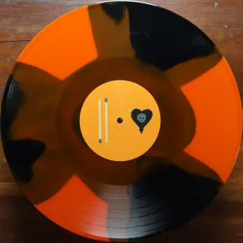 <u>PRESSING INFO</u><br><table class=inf_press><tbody><tr class=inf_info><td class=inf_title>Album:</td><td class=inf_info> Maybe I'll Catch Fire on Triple Button 'Orange & Black'  </td></tr>
    <td class=inf_title>Pressing:</td><td> Sixteenth Pressing /1000  </td></tr>
    <td class=inf_title>Release Date:</td><td> July 2022  </td></tr>
    <td class=inf_title>Album Pressed:</td><td> 2022  </td></tr>
    <td class=inf_title>Label:</td><td> Asianman Records AM 055  </td></tr>
    <td class=inf_title>Insert:</td><td> Double Sided Glossy  </td></tr>
    <td class=inf_title>Barcode:</td><td> 6 12851-0055-1 8  </td></tr>
    <td class=inf_title>Side A Matrix:</td><td> ANDRIANO LIKES THE CUBS 213030E1/A  </td></tr>
    <td class=inf_title>Side B Matrix:</td><td> SKIBA LIKES VEGAN CHICKEN WINGS 213030E2/A  </td></tr>
    <td class=inf_title>&nbsp;</td><td> <a href=https://www.discogs.com/release/24039869 target=_blank rel=noopener noreferrer>View This Release on Discogs</a>  </tr></tbody></table>
<br><u>PRICING</u><span class='less' style='padding-left: 8px; color: var(--font-colour_grey);'>(prices shown in USD)</span><br><table class='inf_press'><tbody><tr class='inf_info'>
            <td class='inf_title'>Last Sold:</td>
            <td>$15.00 (Mar 29, 2026)</td>
            </tr><tr class='inf_info'>
            <td class='inf_title'>History:</td>
            <td>
                <span class='price-low' title='Sold on Mar 29, 2026'>Low: <span class='price-value'>$15.00</span></span>
                <span class='price-separator'>|</span>
                <span class='price-avg'>Avg: <span class='price-value'>$29.41</span></span>
                <span class='price-separator'>|</span>
                <span class='price-high' title='Sold on Jul 17, 2023'>High: <span class='price-value'>$40.00</span></span>
            </td>
            </tr></tbody></table><br>    <br><br><u>TRACKLIST</u><br><table class='inf_tracks'><tbody><tr>
            <td class='inf_num'>A1</td>
            <td class='inf_trk'>Keep ’Em Coming</td>
            <td class='inf_len'>4:10</td>
            <td><a href='#' class='lyric-link' data-album-code='micf' data-song-title='Keep ’Em Coming'>Lyrics</a></td></tr><tr>
            <td class='inf_num'>A2</td>
            <td class='inf_trk'>Madam Me</td>
            <td class='inf_len'>2:59</td>
            <td><a href='#' class='lyric-link' data-album-code='micf' data-song-title='Madam Me'>Lyrics</a></td></tr><tr>
            <td class='inf_num'>A3</td>
            <td class='inf_trk'>You’ve Got So Far To Go</td>
            <td class='inf_len'>3:14</td>
            <td><a href='#' class='lyric-link' data-album-code='micf' data-song-title='You’ve Got So Far To Go'>Lyrics</a></td></tr><tr>
            <td class='inf_num'>A4</td>
            <td class='inf_trk'>Fuck You Aurora</td>
            <td class='inf_len'>4:49</td>
            <td><a href='#' class='lyric-link' data-album-code='micf' data-song-title='Fuck You Aurora'>Lyrics</a></td></tr><tr>
            <td class='inf_num'>A5</td>
            <td class='inf_trk'>Sleepyhead</td>
            <td class='inf_len'>3:56</td>
            <td><a href='#' class='lyric-link' data-album-code='micf' data-song-title='Sleepyhead'>Lyrics</a></td></tr><tr>
            <td class='inf_num'>B1</td>
            <td class='inf_trk'>Maybe I’ll Catch Fire</td>
            <td class='inf_len'>3:07</td>
            <td><a href='#' class='lyric-link' data-album-code='micf' data-song-title='Maybe I’ll Catch Fire'>Lyrics</a></td></tr><tr>
            <td class='inf_num'>B2</td>
            <td class='inf_trk'>Tuck Me In</td>
            <td class='inf_len'>2:39</td>
            <td><a href='#' class='lyric-link' data-album-code='micf' data-song-title='Tuck Me In'>Lyrics</a></td></tr><tr>
            <td class='inf_num'>B3</td>
            <td class='inf_trk'>She Took Him To The Lake</td>
            <td class='inf_len'>2:40</td>
            <td><a href='#' class='lyric-link' data-album-code='micf' data-song-title='She Took Him To The Lake'>Lyrics</a></td></tr><tr>
            <td class='inf_num'>B4</td>
            <td class='inf_trk'>5-3-10-4</td>
            <td class='inf_len'>2:56</td>
            <td><a href='#' class='lyric-link' data-album-code='micf' data-song-title='5-3-10-4'>Lyrics</a></td></tr><tr>
            <td class='inf_num'>B5</td>
            <td class='inf_trk'>Radio</td>
            <td class='inf_len'>4:41</td>
            <td><a href='#' class='lyric-link' data-album-code='micf' data-song-title='Radio'>Lyrics</a></td></tr></tbody></table><br><br>
    <u>NOTES</u><br> The same matrix etching as the 20th Anniversary Picture Disc.
 - B