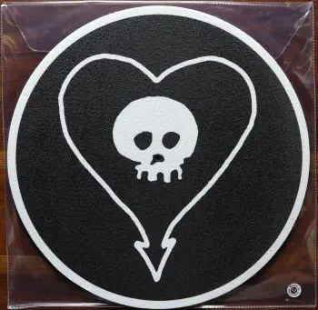 <u>PRESSING INFO</u><br><table class=inf_press><tbody><tr class=inf_info><td class=inf_title>Album:</td><td class=inf_info> Maybe I'll Catch Fire on 20th Anniversary Picture Disk  </td></tr>
    <td class=inf_title>Pressing:</td><td> Twelfth Pressing /2000  </td></tr>
    <td class=inf_title>Release Date:</td><td> Nov. 24th 2020  </td></tr>
    <td class=inf_title>Album Pressed:</td><td> 2020  </td></tr>
    <td class=inf_title>Label:</td><td> Asianman Records AM 055  </td></tr>
    <td class=inf_title>Insert:</td><td> none  </td></tr>
    <td class=inf_title>Barcode:</td><td> none  </td></tr>
    <td class=inf_title>Side A Matrix:</td><td> ANDRIANO LIKES THE CUBS 213030E1/A  </td></tr>
    <td class=inf_title>Side B Matrix:</td><td> SKIBA LIKES VEGAN CHICKEN WINGS 213030E2/A  </td></tr>
    <td class=inf_title>&nbsp;</td><td> <a href=https://www.discogs.com/release/16297375 target=_blank rel=noopener noreferrer>View This Release on Discogs</a>  </tr></tbody></table>
<br><u>PRICING</u><span class='less' style='padding-left: 8px; color: var(--font-colour_grey);'>(prices shown in USD)</span><br><table class='inf_press'><tbody><tr class='inf_info'>
            <td class='inf_title'>Last Sold:</td>
            <td>$35.00 (Jul 3, 2026)</td>
            </tr><tr class='inf_info'>
            <td class='inf_title'>History:</td>
            <td>
                <span class='price-low' title='Sold on Jul 27, 2025'>Low: <span class='price-value'>$17.99</span></span>
                <span class='price-separator'>|</span>
                <span class='price-avg'>Avg: <span class='price-value'>$32.65</span></span>
                <span class='price-separator'>|</span>
                <span class='price-high' title='€45.00 · Sold on Jun 16, 2022'>High: <span class='price-value'>$51.25</span></span>
            </td>
            </tr></tbody></table><br>    <br><br><u>TRACKLIST</u><br><table class='inf_tracks'><tbody><tr>
            <td class='inf_num'>A1</td>
            <td class='inf_trk'>Keep ’Em Coming</td>
            <td class='inf_len'>4:10</td>
            <td><a href='#' class='lyric-link' data-album-code='micf' data-song-title='Keep ’Em Coming'>Lyrics</a></td></tr><tr>
            <td class='inf_num'>A2</td>
            <td class='inf_trk'>Madam Me</td>
            <td class='inf_len'>2:59</td>
            <td><a href='#' class='lyric-link' data-album-code='micf' data-song-title='Madam Me'>Lyrics</a></td></tr><tr>
            <td class='inf_num'>A3</td>
            <td class='inf_trk'>You’ve Got So Far To Go</td>
            <td class='inf_len'>3:14</td>
            <td><a href='#' class='lyric-link' data-album-code='micf' data-song-title='You’ve Got So Far To Go'>Lyrics</a></td></tr><tr>
            <td class='inf_num'>A4</td>
            <td class='inf_trk'>Fuck You Aurora</td>
            <td class='inf_len'>4:49</td>
            <td><a href='#' class='lyric-link' data-album-code='micf' data-song-title='Fuck You Aurora'>Lyrics</a></td></tr><tr>
            <td class='inf_num'>A5</td>
            <td class='inf_trk'>Sleepyhead</td>
            <td class='inf_len'>3:56</td>
            <td><a href='#' class='lyric-link' data-album-code='micf' data-song-title='Sleepyhead'>Lyrics</a></td></tr><tr>
            <td class='inf_num'>B1</td>
            <td class='inf_trk'>Maybe I’ll Catch Fire</td>
            <td class='inf_len'>3:07</td>
            <td><a href='#' class='lyric-link' data-album-code='micf' data-song-title='Maybe I’ll Catch Fire'>Lyrics</a></td></tr><tr>
            <td class='inf_num'>B2</td>
            <td class='inf_trk'>Tuck Me In</td>
            <td class='inf_len'>2:39</td>
            <td><a href='#' class='lyric-link' data-album-code='micf' data-song-title='Tuck Me In'>Lyrics</a></td></tr><tr>
            <td class='inf_num'>B3</td>
            <td class='inf_trk'>She Took Him To The Lake</td>
            <td class='inf_len'>2:40</td>
            <td><a href='#' class='lyric-link' data-album-code='micf' data-song-title='She Took Him To The Lake'>Lyrics</a></td></tr><tr>
            <td class='inf_num'>B4</td>
            <td class='inf_trk'>5-3-10-4</td>
            <td class='inf_len'>2:56</td>
            <td><a href='#' class='lyric-link' data-album-code='micf' data-song-title='5-3-10-4'>Lyrics</a></td></tr><tr>
            <td class='inf_num'>B5</td>
            <td class='inf_trk'>Radio</td>
            <td class='inf_len'>4:41</td>
            <td><a href='#' class='lyric-link' data-album-code='micf' data-song-title='Radio'>Lyrics</a></td></tr></tbody></table><br><br>
    <u>NOTES</u><br> The 1st 200 copies came with a Heart/Skull logo slipmat. Comes in plain plastic sleeve with Pirates Press Made in CZ sticker.
 - Slipmat