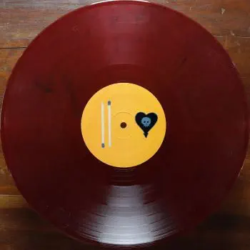 <u>PRESSING INFO</u><br><table class=inf_press><tbody><tr class=inf_info><td class=inf_title>Album:</td><td class=inf_info> Maybe I'll Catch Fire on Clear Red with Black Swirl  </td></tr>
    <td class=inf_title>Pressing:</td><td> Second Pressing /500  </td></tr>
    <td class=inf_title>Release Date:</td><td> 2008  </td></tr>
    <td class=inf_title>Album Pressed:</td><td> 2008  </td></tr>
    <td class=inf_title>Label:</td><td> Asianman Records AM 055  </td></tr>
    <td class=inf_title>Insert:</td><td> Double Sided Matte  </td></tr>
    <td class=inf_title>Barcode:</td><td> 6 12851-0055-1 8  </td></tr>
    <td class=inf_title>Side A Matrix:</td><td> 1089-AM055- 1 A 5 S-65692  </td></tr>
    <td class=inf_title>Side B Matrix:</td><td> 7689-AM055-1(B) S-68693  </td></tr>
    <td class=inf_title>&nbsp;</td><td> <a href=https://www.discogs.com/release/1521897 target=_blank rel=noopener noreferrer>View This Release on Discogs</a>  </tr></tbody></table>
<br><u>PRICING</u><span class='less' style='padding-left: 8px; color: var(--font-colour_grey);'>(prices shown in USD)</span><br><table class='inf_press'><tbody><tr class='inf_info'>
            <td class='inf_title'>Last Sold:</td>
            <td>$17.00 (Feb 26, 2025)</td>
            </tr><tr class='inf_info'>
            <td class='inf_title'>History:</td>
            <td>
                <span class='price-low' title='A$23.00 · Sold on Jun 23, 2013'>Low: <span class='price-value'>$16.10</span></span>
                <span class='price-separator'>|</span>
                <span class='price-avg'>Avg: <span class='price-value'>$28.11</span></span>
                <span class='price-separator'>|</span>
                <span class='price-high' title='Sold on Jan 1, 2021'>High: <span class='price-value'>$66.60</span></span>
            </td>
            </tr></tbody></table><br>    <br><br><u>TRACKLIST</u><br><table class='inf_tracks'><tbody><tr>
            <td class='inf_num'>A1</td>
            <td class='inf_trk'>Keep ’Em Coming</td>
            <td class='inf_len'>4:10</td>
            <td><a href='#' class='lyric-link' data-album-code='micf' data-song-title='Keep ’Em Coming'>Lyrics</a></td></tr><tr>
            <td class='inf_num'>A2</td>
            <td class='inf_trk'>Madam Me</td>
            <td class='inf_len'>2:59</td>
            <td><a href='#' class='lyric-link' data-album-code='micf' data-song-title='Madam Me'>Lyrics</a></td></tr><tr>
            <td class='inf_num'>A3</td>
            <td class='inf_trk'>You’ve Got So Far To Go</td>
            <td class='inf_len'>3:14</td>
            <td><a href='#' class='lyric-link' data-album-code='micf' data-song-title='You’ve Got So Far To Go'>Lyrics</a></td></tr><tr>
            <td class='inf_num'>A4</td>
            <td class='inf_trk'>Fuck You Aurora</td>
            <td class='inf_len'>4:49</td>
            <td><a href='#' class='lyric-link' data-album-code='micf' data-song-title='Fuck You Aurora'>Lyrics</a></td></tr><tr>
            <td class='inf_num'>A5</td>
            <td class='inf_trk'>Sleepyhead</td>
            <td class='inf_len'>3:56</td>
            <td><a href='#' class='lyric-link' data-album-code='micf' data-song-title='Sleepyhead'>Lyrics</a></td></tr><tr>
            <td class='inf_num'>B1</td>
            <td class='inf_trk'>Maybe I’ll Catch Fire</td>
            <td class='inf_len'>3:07</td>
            <td><a href='#' class='lyric-link' data-album-code='micf' data-song-title='Maybe I’ll Catch Fire'>Lyrics</a></td></tr><tr>
            <td class='inf_num'>B2</td>
            <td class='inf_trk'>Tuck Me In</td>
            <td class='inf_len'>2:39</td>
            <td><a href='#' class='lyric-link' data-album-code='micf' data-song-title='Tuck Me In'>Lyrics</a></td></tr><tr>
            <td class='inf_num'>B3</td>
            <td class='inf_trk'>She Took Him To The Lake</td>
            <td class='inf_len'>2:40</td>
            <td><a href='#' class='lyric-link' data-album-code='micf' data-song-title='She Took Him To The Lake'>Lyrics</a></td></tr><tr>
            <td class='inf_num'>B4</td>
            <td class='inf_trk'>5-3-10-4</td>
            <td class='inf_len'>2:56</td>
            <td><a href='#' class='lyric-link' data-album-code='micf' data-song-title='5-3-10-4'>Lyrics</a></td></tr><tr>
            <td class='inf_num'>B5</td>
            <td class='inf_trk'>Radio</td>
            <td class='inf_len'>4:41</td>
            <td><a href='#' class='lyric-link' data-album-code='micf' data-song-title='Radio'>Lyrics</a></td></tr></tbody></table><br><br>
    <u>NOTES</u><br> There was a bundle Summer of 2008 on Asian Man Records that included 'MICF 180g Black', 'MICF Clear Red with Black Swirl', 'GD 180g Black', 'GD White with Red Swirl', a t-shirt, pint glass, beer coozie, and a button (all with an Olde Style logo).
 - B