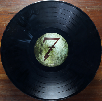 <u>PRESSING INFO</u><br><table class=inf_press><tbody><tr class=inf_info><td class=inf_title>Album:</td><td class=inf_info> This Addiction on Black Marble  </td></tr>
    <td class=inf_title>Pressing:</td><td> Pressing Error /??  </td></tr>
    <td class=inf_title>Release Date:</td><td> Feb. 23rd 2010  </td></tr>
    <td class=inf_title>Album Pressed:</td><td> 2010  </td></tr>
    <td class=inf_title>Label:</td><td> Heart&Skull Records/Epitaph 87075-1  </td></tr>
    <td class=inf_title>Insert:</td><td> Printed Inner Glossy Sleeve  </td></tr>
    <td class=inf_title>Barcode:</td><td> 0 45778-70751 5  </td></tr>
    <td class=inf_title>Side A Matrix:</td><td> 87075-A RJ STERLING  </td></tr>
    <td class=inf_title>Side B Matrix:</td><td> 87075-B RJ STERLING  </td></tr>
    <td class=inf_title>&nbsp;</td><td> <a href=https://www.discogs.com/release/7085100 target=_blank rel=noopener noreferrer>View This Release on Discogs</a>  </tr></tbody></table>
<br><u>PRICING</u><span class='less' style='padding-left: 8px; color: var(--font-colour_grey);'>(prices shown in USD)</span><br><table class='inf_press'><tbody><tr class='inf_info'>
            <td class='inf_title'>Last Sold:</td>
            <td>$39.95 (Feb 19, 2018)</td>
            </tr><tr class='inf_info'>
            <td class='inf_title'>History:</td>
            <td>
                <span class='price-low' title='Sold on Feb 19, 2018'>Low: <span class='price-value'>$39.95</span></span>
                <span class='price-separator'>|</span>
                <span class='price-avg'>Avg: <span class='price-value'>$39.95</span></span>
                <span class='price-separator'>|</span>
                <span class='price-high' title='Sold on Feb 19, 2018'>High: <span class='price-value'>$39.95</span></span>
            </td>
            </tr></tbody></table><br>    <br><br><u>TRACKLIST</u><br><table class='inf_tracks'><tbody><tr>
            <td class='inf_num'>A1</td>
            <td class='inf_trk'>This Addiction</td>
            <td class='inf_len'>2:35</td>
            <td><a href='#' class='lyric-link' data-album-code='ta' data-song-title='This Addiction'>Lyrics</a></td></tr><tr>
            <td class='inf_num'>A2</td>
            <td class='inf_trk'>Dine, Dine My Darling</td>
            <td class='inf_len'>2:58</td>
            <td><a href='#' class='lyric-link' data-album-code='ta' data-song-title='Dine, Dine My Darling'>Lyrics</a></td></tr><tr>
            <td class='inf_num'>A3</td>
            <td class='inf_trk'>Lead Poisoning</td>
            <td class='inf_len'>2:37</td>
            <td><a href='#' class='lyric-link' data-album-code='ta' data-song-title='Lead Poisoning'>Lyrics</a></td></tr><tr>
            <td class='inf_num'>A4</td>
            <td class='inf_trk'>Dead On The Floor</td>
            <td class='inf_len'>4:20</td>
            <td><a href='#' class='lyric-link' data-album-code='ta' data-song-title='Dead On The Floor'>Lyrics</a></td></tr><tr>
            <td class='inf_num'>A5</td>
            <td class='inf_trk'>The American Scream</td>
            <td class='inf_len'>3:00</td>
            <td><a href='#' class='lyric-link' data-album-code='ta' data-song-title='The American Scream'>Lyrics</a></td></tr><tr>
            <td class='inf_num'>A6</td>
            <td class='inf_trk'>Off The Map</td>
            <td class='inf_len'>3:16</td>
            <td><a href='#' class='lyric-link' data-album-code='ta' data-song-title='Off The Map'>Lyrics</a></td></tr><tr>
            <td class='inf_num'>B1</td>
            <td class='inf_trk'>Draculina</td>
            <td class='inf_len'>3:34</td>
            <td><a href='#' class='lyric-link' data-album-code='ta' data-song-title='Draculina'>Lyrics</a></td></tr><tr>
            <td class='inf_num'>B2</td>
            <td class='inf_trk'>Eating Me Alive</td>
            <td class='inf_len'>2:53</td>
            <td><a href='#' class='lyric-link' data-album-code='ta' data-song-title='Eating Me Alive'>Lyrics</a></td></tr><tr>
            <td class='inf_num'>B3</td>
            <td class='inf_trk'>Piss And Vinegar</td>
            <td class='inf_len'>2:28</td>
            <td><a href='#' class='lyric-link' data-album-code='ta' data-song-title='Piss And Vinegar'>Lyrics</a></td></tr><tr>
            <td class='inf_num'>B4</td>
            <td class='inf_trk'>Dorothy</td>
            <td class='inf_len'>3:32</td>
            <td><a href='#' class='lyric-link' data-album-code='ta' data-song-title='Dorothy'>Lyrics</a></td></tr><tr>
            <td class='inf_num'>B5</td>
            <td class='inf_trk'>Fine</td>
            <td class='inf_len'>3:17</td>
            <td><a href='#' class='lyric-link' data-album-code='ta' data-song-title='Fine'>Lyrics</a></td></tr></tbody></table><br><br>
    <u>NOTES</u><br> This is a 'Made In Canada' labeled black marble pressing. This pressing has very visible white marbling, and when held in the light or photographed, it has blue/grey undertones. I believe this may be an earlier result in the pressing process that lead us to getting the Grey Marble pressing error.
 - B