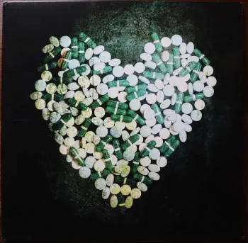 <u>PRESSING INFO</u><br><table class=inf_press><tbody><tr class=inf_info><td class=inf_title>Album:</td><td class=inf_info> This Addiction on Clear Green  </td></tr>
    <td class=inf_title>Pressing:</td><td> First Pressing /1000  </td></tr>
    <td class=inf_title>Release Date:</td><td> Feb. 23rd 2010  </td></tr>
    <td class=inf_title>Album Pressed:</td><td> 2010  </td></tr>
    <td class=inf_title>Label:</td><td> Heart&Skull Records/Epitaph 87075-1  </td></tr>
    <td class=inf_title>Insert:</td><td> Printed Satin Inner Sleeve  </td></tr>
    <td class=inf_title>Barcode:</td><td> 0 45778-70751 5  </td></tr>
    <td class=inf_title>Side A Matrix:</td><td> 87075-A RJ STERLING  </td></tr>
    <td class=inf_title>Side B Matrix:</td><td> 87075-B RJ STERLING  </td></tr>
    <td class=inf_title>&nbsp;</td><td> <a href=https://www.discogs.com/release/2153106 target=_blank rel=noopener noreferrer>View This Release on Discogs</a>  </tr></tbody></table>
<br><u>PRICING</u><span class='less' style='padding-left: 8px; color: var(--font-colour_grey);'>(prices shown in USD)</span><br><table class='inf_press'><tbody><tr class='inf_info'>
            <td class='inf_title'>Last Sold:</td>
            <td>$32.00 (Dec 18, 2025)</td>
            </tr><tr class='inf_info'>
            <td class='inf_title'>History:</td>
            <td>
                <span class='price-low' title='Sold on Oct 24, 2019'>Low: <span class='price-value'>$26.00</span></span>
                <span class='price-separator'>|</span>
                <span class='price-avg'>Avg: <span class='price-value'>$48.33</span></span>
                <span class='price-separator'>|</span>
                <span class='price-high' title='Sold on Sep 30, 2022'>High: <span class='price-value'>$84.99</span></span>
            </td>
            </tr></tbody></table><br>    <br><br><u>TRACKLIST</u><br><table class='inf_tracks'><tbody><tr>
            <td class='inf_num'>A1</td>
            <td class='inf_trk'>This Addiction</td>
            <td class='inf_len'>2:35</td>
            <td><a href='#' class='lyric-link' data-album-code='ta' data-song-title='This Addiction'>Lyrics</a></td></tr><tr>
            <td class='inf_num'>A2</td>
            <td class='inf_trk'>Dine, Dine My Darling</td>
            <td class='inf_len'>2:58</td>
            <td><a href='#' class='lyric-link' data-album-code='ta' data-song-title='Dine, Dine My Darling'>Lyrics</a></td></tr><tr>
            <td class='inf_num'>A3</td>
            <td class='inf_trk'>Lead Poisoning</td>
            <td class='inf_len'>2:37</td>
            <td><a href='#' class='lyric-link' data-album-code='ta' data-song-title='Lead Poisoning'>Lyrics</a></td></tr><tr>
            <td class='inf_num'>A4</td>
            <td class='inf_trk'>Dead On The Floor</td>
            <td class='inf_len'>4:20</td>
            <td><a href='#' class='lyric-link' data-album-code='ta' data-song-title='Dead On The Floor'>Lyrics</a></td></tr><tr>
            <td class='inf_num'>A5</td>
            <td class='inf_trk'>The American Scream</td>
            <td class='inf_len'>3:00</td>
            <td><a href='#' class='lyric-link' data-album-code='ta' data-song-title='The American Scream'>Lyrics</a></td></tr><tr>
            <td class='inf_num'>A6</td>
            <td class='inf_trk'>Off The Map</td>
            <td class='inf_len'>3:16</td>
            <td><a href='#' class='lyric-link' data-album-code='ta' data-song-title='Off The Map'>Lyrics</a></td></tr><tr>
            <td class='inf_num'>B1</td>
            <td class='inf_trk'>Draculina</td>
            <td class='inf_len'>3:34</td>
            <td><a href='#' class='lyric-link' data-album-code='ta' data-song-title='Draculina'>Lyrics</a></td></tr><tr>
            <td class='inf_num'>B2</td>
            <td class='inf_trk'>Eating Me Alive</td>
            <td class='inf_len'>2:53</td>
            <td><a href='#' class='lyric-link' data-album-code='ta' data-song-title='Eating Me Alive'>Lyrics</a></td></tr><tr>
            <td class='inf_num'>B3</td>
            <td class='inf_trk'>Piss And Vinegar</td>
            <td class='inf_len'>2:28</td>
            <td><a href='#' class='lyric-link' data-album-code='ta' data-song-title='Piss And Vinegar'>Lyrics</a></td></tr><tr>
            <td class='inf_num'>B4</td>
            <td class='inf_trk'>Dorothy</td>
            <td class='inf_len'>3:32</td>
            <td><a href='#' class='lyric-link' data-album-code='ta' data-song-title='Dorothy'>Lyrics</a></td></tr><tr>
            <td class='inf_num'>B5</td>
            <td class='inf_trk'>Fine</td>
            <td class='inf_len'>3:17</td>
            <td><a href='#' class='lyric-link' data-album-code='ta' data-song-title='Fine'>Lyrics</a></td></tr></tbody></table><br><br>
    <u>NOTES</u><br> Gatefold sleeve. Printed inner sleeve. I believe this came with a hype sticker that matched the Black US release, but my copy no longer has the shrink to verify. Center labels have Made in Canada printed and have darker coloring than those without the Made in Canada text.
 - Cover