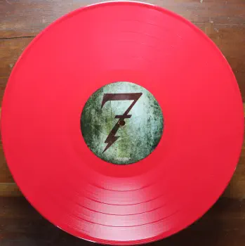 <u>PRESSING INFO</u><br><table class=inf_press><tbody><tr class=inf_info><td class=inf_title>Album:</td><td class=inf_info> This Addiction on Red  </td></tr>
    <td class=inf_title>Pressing:</td><td> First Pressing /500  </td></tr>
    <td class=inf_title>Release Date:</td><td> Feb. 23rd 2010  </td></tr>
    <td class=inf_title>Album Pressed:</td><td> 2010  </td></tr>
    <td class=inf_title>Label:</td><td> Heart&Skull Records/Epitaph 87075-1  </td></tr>
    <td class=inf_title>Insert:</td><td> Printed Satin Inner Sleeve  </td></tr>
    <td class=inf_title>Barcode:</td><td> 0 45778-70751 5  </td></tr>
    <td class=inf_title>Side A Matrix:</td><td> 87075-A RJ STERLING  </td></tr>
    <td class=inf_title>Side B Matrix:</td><td> 87075-B RJ STERLING  </td></tr>
    <td class=inf_title>&nbsp;</td><td> <a href=https://www.discogs.com/release/2153103 target=_blank rel=noopener noreferrer>View This Release on Discogs</a>  </tr></tbody></table>
<br><u>PRICING</u><span class='less' style='padding-left: 8px; color: var(--font-colour_grey);'>(prices shown in USD)</span><br><table class='inf_press'><tbody><tr class='inf_info'>
            <td class='inf_title'>Last Sold:</td>
            <td>$31.99 (Jun 2, 2026)</td>
            </tr><tr class='inf_info'>
            <td class='inf_title'>History:</td>
            <td>
                <span class='price-low' title='Sold on Feb 10, 2013'>Low: <span class='price-value'>$16.00</span></span>
                <span class='price-separator'>|</span>
                <span class='price-avg'>Avg: <span class='price-value'>$33.33</span></span>
                <span class='price-separator'>|</span>
                <span class='price-high' title='€69.00 · Sold on Jan 26, 2024'>High: <span class='price-value'>$78.58</span></span>
            </td>
            </tr></tbody></table><br>    <br><br><u>TRACKLIST</u><br><table class='inf_tracks'><tbody><tr>
            <td class='inf_num'>A1</td>
            <td class='inf_trk'>This Addiction</td>
            <td class='inf_len'>2:35</td>
            <td><a href='#' class='lyric-link' data-album-code='ta' data-song-title='This Addiction'>Lyrics</a></td></tr><tr>
            <td class='inf_num'>A2</td>
            <td class='inf_trk'>Dine, Dine My Darling</td>
            <td class='inf_len'>2:58</td>
            <td><a href='#' class='lyric-link' data-album-code='ta' data-song-title='Dine, Dine My Darling'>Lyrics</a></td></tr><tr>
            <td class='inf_num'>A3</td>
            <td class='inf_trk'>Lead Poisoning</td>
            <td class='inf_len'>2:37</td>
            <td><a href='#' class='lyric-link' data-album-code='ta' data-song-title='Lead Poisoning'>Lyrics</a></td></tr><tr>
            <td class='inf_num'>A4</td>
            <td class='inf_trk'>Dead On The Floor</td>
            <td class='inf_len'>4:20</td>
            <td><a href='#' class='lyric-link' data-album-code='ta' data-song-title='Dead On The Floor'>Lyrics</a></td></tr><tr>
            <td class='inf_num'>A5</td>
            <td class='inf_trk'>The American Scream</td>
            <td class='inf_len'>3:00</td>
            <td><a href='#' class='lyric-link' data-album-code='ta' data-song-title='The American Scream'>Lyrics</a></td></tr><tr>
            <td class='inf_num'>A6</td>
            <td class='inf_trk'>Off The Map</td>
            <td class='inf_len'>3:16</td>
            <td><a href='#' class='lyric-link' data-album-code='ta' data-song-title='Off The Map'>Lyrics</a></td></tr><tr>
            <td class='inf_num'>B1</td>
            <td class='inf_trk'>Draculina</td>
            <td class='inf_len'>3:34</td>
            <td><a href='#' class='lyric-link' data-album-code='ta' data-song-title='Draculina'>Lyrics</a></td></tr><tr>
            <td class='inf_num'>B2</td>
            <td class='inf_trk'>Eating Me Alive</td>
            <td class='inf_len'>2:53</td>
            <td><a href='#' class='lyric-link' data-album-code='ta' data-song-title='Eating Me Alive'>Lyrics</a></td></tr><tr>
            <td class='inf_num'>B3</td>
            <td class='inf_trk'>Piss And Vinegar</td>
            <td class='inf_len'>2:28</td>
            <td><a href='#' class='lyric-link' data-album-code='ta' data-song-title='Piss And Vinegar'>Lyrics</a></td></tr><tr>
            <td class='inf_num'>B4</td>
            <td class='inf_trk'>Dorothy</td>
            <td class='inf_len'>3:32</td>
            <td><a href='#' class='lyric-link' data-album-code='ta' data-song-title='Dorothy'>Lyrics</a></td></tr><tr>
            <td class='inf_num'>B5</td>
            <td class='inf_trk'>Fine</td>
            <td class='inf_len'>3:17</td>
            <td><a href='#' class='lyric-link' data-album-code='ta' data-song-title='Fine'>Lyrics</a></td></tr></tbody></table><br><br>
    <u>NOTES</u><br> The first 100 copies pre ordered were signed by the band. Gatefold sleeve. Printed inner sleeve. I believe this came with a hype sticker that matched the Black US release, but my copy no longer has the shrink to verify. Center labels have Made in Canada printed and have darker coloring than those without the Made in Canada text.
 - B