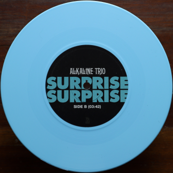 <u>PRESSING INFO</u><br><table class=inf_press><tbody><tr class=inf_info><td class=inf_title>Album:</td><td class=inf_info> Surprise Surprise on Baby Blue  </td></tr>
    <td class=inf_title>Pressing:</td><td> First Pressing /2000  </td></tr>
    <td class=inf_title>Release Date:</td><td> Apr. 10th 2026  </td></tr>
    <td class=inf_title>Album Pressed:</td><td> 2026  </td></tr>
    <td class=inf_title>Label:</td><td> Rise Records  </td></tr>
    <td class=inf_title>Insert:</td><td> none  </td></tr>
    <td class=inf_title>Barcode:</td><td> 4 09996 419497 5  </td></tr>
    <td class=inf_title>Side A Matrix:</td><td> 10-116044 / 4099964194975 - A 310552H1/A 02427267  </td></tr>
    <td class=inf_title>Side B Matrix:</td><td> 10-116044 / 4099964194975 - B 310552H2/A 02427268  </td></tr>
    <td class=inf_title>&nbsp;</td><td> <a href= target=_blank rel=noopener noreferrer>View This Release on Discogs</a>  </tr></tbody></table>
    <br><br><u>TRACKLIST</u><br><table class='inf_tracks'><tbody><tr>
            <td class='inf_num'>A1</td>
            <td class='inf_trk'>Surprise Surprise</td>
            <td class='inf_len'>4:13</td>
            <td><a href='#' class='lyric-link' data-album-code='singles' data-song-title='Surprise Surprise'>Lyrics</a></td></tr><tr>
            <td class='inf_num'>B1</td>
            <td class='inf_trk'>Surprise Surprise (Matt’s Demo)</td>
            <td class='inf_len'>3:42</td>
            <td><a href='#' class='lyric-link' data-album-code='singles' data-song-title='Surprise Surprise (Matt’s Demo)'>Lyrics</a></td></tr></tbody></table><br><br>
    <u>NOTES</u><br> Part 3 of a 3 piece series, on Baby Blue vinyl 7''. Side A features the song 'Surprise Surprise' and Side B features Matt's original demo version of 'Surprise Surprise'. This vinyl went up for pre-order the day Surprise Surprise was released; October 31st 2025. Copies began appearing online on early February 2026, well before the release date. There is no catalog number printed anywhere on this release.
 - B