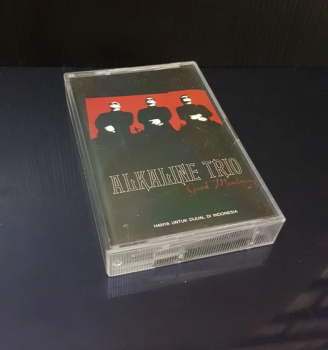 <u>PRESSING INFO</u><br><table class=inf_press><tbody><tr class=inf_info><td class=inf_title>Album:</td><td class=inf_info> Good Mourning Cassette on Clear Cassette  </td></tr>
    <td class=inf_title>Pressing:</td><td> First Pressing /??  </td></tr>
    <td class=inf_title>Release Date:</td><td> 2003  </td></tr>
    <td class=inf_title>Album Pressed:</td><td> 2003  </td></tr>
    <td class=inf_title>Label:</td><td> Aquarius - APC JVC 339-4  </td></tr>
    <td class=inf_title>Insert:</td><td> Printed Insert  </td></tr>
    <td class=inf_title>Barcode:</td><td> none  </td></tr>
    <td class=inf_title>Side A Matrix:</td><td> none  </td></tr>
    <td class=inf_title>Side B Matrix:</td><td> none  </td></tr>
    <td class=inf_title>&nbsp;</td><td> <a href=https://www.discogs.com/release/12216217 target=_blank rel=noopener noreferrer>View This Release on Discogs</a>  </tr></tbody></table>
    <br><br><u>TRACKLIST</u><br><table class='inf_tracks'><tbody><tr>
            <td class='inf_num'>A1</td>
            <td class='inf_trk'>This Could Be Love (For Fire)</td>
            <td class='inf_len'>3:47</td>
            <td><a href='#' class='lyric-link' data-album-code='cass' data-song-title='This Could Be Love (For Fire)'>Lyrics</a></td></tr><tr>
            <td class='inf_num'>A2</td>
            <td class='inf_trk'>We’ve Had Enough</td>
            <td class='inf_len'>2:51</td>
            <td><a href='#' class='lyric-link' data-album-code='cass' data-song-title='We’ve Had Enough'>Lyrics</a></td></tr><tr>
            <td class='inf_num'>A3</td>
            <td class='inf_trk'>One Hundred Stories</td>
            <td class='inf_len'>3:40</td>
            <td><a href='#' class='lyric-link' data-album-code='cass' data-song-title='One Hundred Stories'>Lyrics</a></td></tr><tr>
            <td class='inf_num'>A4</td>
            <td class='inf_trk'>Continental</td>
            <td class='inf_len'>3:28</td>
            <td><a href='#' class='lyric-link' data-album-code='cass' data-song-title='Continental'>Lyrics</a></td></tr><tr>
            <td class='inf_num'>A5</td>
            <td class='inf_trk'>All On Black</td>
            <td class='inf_len'>4:00</td>
            <td><a href='#' class='lyric-link' data-album-code='cass' data-song-title='All On Black'>Lyrics</a></td></tr><tr>
            <td class='inf_num'>A6</td>
            <td class='inf_trk'>Emma</td>
            <td class='inf_len'>2:42</td>
            <td><a href='#' class='lyric-link' data-album-code='cass' data-song-title='Emma'>Lyrics</a></td></tr><tr>
            <td class='inf_num'>B1</td>
            <td class='inf_trk'>Fatally Yours</td>
            <td class='inf_len'>2:16</td>
            <td><a href='#' class='lyric-link' data-album-code='cass' data-song-title='Fatally Yours'>Lyrics</a></td></tr><tr>
            <td class='inf_num'>B2</td>
            <td class='inf_trk'>Every Thug Needs A Lady</td>
            <td class='inf_len'>3:18</td>
            <td><a href='#' class='lyric-link' data-album-code='cass' data-song-title='Every Thug Needs A Lady'>Lyrics</a></td></tr><tr>
            <td class='inf_num'>B3</td>
            <td class='inf_trk'>Blue Carolina</td>
            <td class='inf_len'>3:28</td>
            <td><a href='#' class='lyric-link' data-album-code='cass' data-song-title='Blue Carolina'>Lyrics</a></td></tr><tr>
            <td class='inf_num'>B4</td>
            <td class='inf_trk'>Donner Party (All Night)</td>
            <td class='inf_len'>2:44</td>
            <td><a href='#' class='lyric-link' data-album-code='cass' data-song-title='Donner Party (All Night)'>Lyrics</a></td></tr><tr>
            <td class='inf_num'>B5</td>
            <td class='inf_trk'>If We Never Go Inside</td>
            <td class='inf_len'>3:46</td>
            <td><a href='#' class='lyric-link' data-album-code='cass' data-song-title='If We Never Go Inside'>Lyrics</a></td></tr><tr>
            <td class='inf_num'>B6</td>
            <td class='inf_trk'>Blue In The Face</td>
            <td class='inf_len'>3:02</td>
            <td><a href='#' class='lyric-link' data-album-code='cass' data-song-title='Blue In The Face'>Lyrics</a></td></tr><tr>
            <td class='inf_num'>B7</td>
            <td class='inf_trk'>Dead End Road</td>
            <td class='inf_len'>3:00</td>
            <td><a href='#' class='lyric-link' data-album-code='cass' data-song-title='Dead End Road'>Lyrics</a></td></tr></tbody></table><br><br>
    <u>NOTES</u><br> Indonesia cassette tape pressing.
 - Front