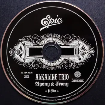 <u>PRESSING INFO</u><br><table class=inf_press><tbody><tr class=inf_info><td class=inf_title>Album:</td><td class=inf_info> Agony & Irony (USA Deluxe Edition) </td></tr>
    <td class=inf_title>Pressing:</td><td> CD </td></tr>
    <td class=inf_title>Release Date:</td><td> Jul. 1st 2008  </td></tr>
    <td class=inf_title>Label:</td><td> Epic Records  </td></tr>
    <td class=inf_title>Catalog Number:</td><td> 88697-31294-2 </td></tr>
    <td class=inf_title>Barcode:</td><td> 8 869731 29425  </td></tr>
    <td class=inf_title>&nbsp;</td><td> <a href=https://www.discogs.com/release/1385425 target=_blank rel=noopener noreferrer>View This Release on Discogs</a> </tr></tbody></table>
    <br><br><u>TRACKLIST</u><br><table class='inf_tracks'><tbody><tr>
            <td class='inf_num'>1</td>
            <td class='inf_trk'>Calling All Skeletons</td>
            <td class='inf_len'>3:19</td>
            <td><a href='#' class='lyric-link' data-album-code='ai' data-song-title='Calling All Skeletons'>Lyrics</a></td></tr><tr>
            <td class='inf_num'>2</td>
            <td class='inf_trk'>Help Me</td>
            <td class='inf_len'>3:45</td>
            <td><a href='#' class='lyric-link' data-album-code='ai' data-song-title='Help Me'>Lyrics</a></td></tr><tr>
            <td class='inf_num'>3</td>
            <td class='inf_trk'>In Vein</td>
            <td class='inf_len'>3:56</td>
            <td><a href='#' class='lyric-link' data-album-code='ai' data-song-title='In Vein'>Lyrics</a></td></tr><tr>
            <td class='inf_num'>4</td>
            <td class='inf_trk'>Over And Out</td>
            <td class='inf_len'>3:14</td>
            <td><a href='#' class='lyric-link' data-album-code='ai' data-song-title='Over And Out'>Lyrics</a></td></tr><tr>
            <td class='inf_num'>5</td>
            <td class='inf_trk'>I Found Away</td>
            <td class='inf_len'>4:01</td>
            <td><a href='#' class='lyric-link' data-album-code='ai' data-song-title='I Found Away'>Lyrics</a></td></tr><tr>
            <td class='inf_num'>6</td>
            <td class='inf_trk'>Do You Wanna Know?</td>
            <td class='inf_len'>3:36</td>
            <td><a href='#' class='lyric-link' data-album-code='ai' data-song-title='Do You Wanna Know?'>Lyrics</a></td></tr><tr>
            <td class='inf_num'>7</td>
            <td class='inf_trk'>Live Young, Die Fast</td>
            <td class='inf_len'>4:14</td>
            <td><a href='#' class='lyric-link' data-album-code='ai' data-song-title='Live Young, Die Fast'>Lyrics</a></td></tr><tr>
            <td class='inf_num'>8</td>
            <td class='inf_trk'>Love Love, Kiss Kiss</td>
            <td class='inf_len'>3:25</td>
            <td><a href='#' class='lyric-link' data-album-code='ai' data-song-title='Love Love, Kiss Kiss'>Lyrics</a></td></tr><tr>
            <td class='inf_num'>9</td>
            <td class='inf_trk'>Lost And Rendered</td>
            <td class='inf_len'>3:23</td>
            <td><a href='#' class='lyric-link' data-album-code='ai' data-song-title='Lost And Rendered'>Lyrics</a></td></tr><tr>
            <td class='inf_num'>10</td>
            <td class='inf_trk'>Ruin It</td>
            <td class='inf_len'>3:36</td>
            <td><a href='#' class='lyric-link' data-album-code='ai' data-song-title='Ruin It'>Lyrics</a></td></tr><tr>
            <td class='inf_num'>11</td>
            <td class='inf_trk'>Into The Night</td>
            <td class='inf_len'>3:23</td>
            <td><a href='#' class='lyric-link' data-album-code='ai' data-song-title='Into The Night'>Lyrics</a></td></tr><tr>
            <td class='inf_num'>CD2 1</td>
            <td class='inf_trk'>Burned Is The House</td>
            <td class='inf_len'>?:??</td>
            <td><a href='#' class='lyric-link' data-album-code='ai' data-song-title='Burned Is The House'>Lyrics</a></td></tr><tr>
            <td class='inf_num'>CD2 2</td>
            <td class='inf_trk'>Maybe I’ll Catch Fire (Acoustic)</td>
            <td class='inf_len'>?:??</td>
            <td><a href='#' class='lyric-link' data-album-code='ai' data-song-title='Maybe I’ll Catch Fire (Acoustic)'>Lyrics</a></td></tr><tr>
            <td class='inf_num'>CD2 3</td>
            <td class='inf_trk'>Live Young, Die Fast (Acoustic)</td>
            <td class='inf_len'>?:??</td>
            <td><a href='#' class='lyric-link' data-album-code='ai' data-song-title='Live Young, Die Fast (Acoustic)'>Lyrics</a></td></tr><tr>
            <td class='inf_num'>CD2 4</td>
            <td class='inf_trk'>Into The Night (Acoustic)</td>
            <td class='inf_len'>?:??</td>
            <td><a href='#' class='lyric-link' data-album-code='ai' data-song-title='Into The Night (Acoustic)'>Lyrics</a></td></tr><tr>
            <td class='inf_num'>CD2 5</td>
            <td class='inf_trk'>Over And Out (Acoustic)</td>
            <td class='inf_len'>?:??</td>
            <td><a href='#' class='lyric-link' data-album-code='ai' data-song-title='Over And Out (Acoustic)'>Lyrics</a></td></tr><tr>
            <td class='inf_num'>CD2 6</td>
            <td class='inf_trk'>Lost And Rendered (Acoustic)</td>
            <td class='inf_len'>?:??</td>
            <td><a href='#' class='lyric-link' data-album-code='ai' data-song-title='Lost And Rendered (Acoustic)'>Lyrics</a></td></tr></tbody></table><br><br>
    <u>NOTES</u><br> 
 - Cd