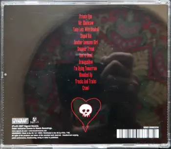 <u>PRESSING INFO</u><br><table class=inf_press><tbody><tr class=inf_info><td class=inf_title>Album:</td><td class=inf_info> Crimson / From Here To Infirmary (UK Edition) </td></tr>
    <td class=inf_title>Pressing:</td><td> CD </td></tr>
    <td class=inf_title>Release Date:</td><td> 2008  </td></tr>
    <td class=inf_title>Label:</td><td> Hassle Records  </td></tr>
    <td class=inf_title>Catalog Number:</td><td> VRUK081CDB </td></tr>
    <td class=inf_title>Barcode:</td><td> 50601000664796  </td></tr>
    <td class=inf_title>&nbsp;</td><td> <a href=https://www.discogs.com/release/8308012 target=_blank rel=noopener noreferrer>View This Release on Discogs</a> </tr></tbody></table>
    <br><br><u>TRACKLIST</u><br><table class='inf_tracks'><tbody><tr>
            <td class='inf_num'>CD1 1</td>
            <td class='inf_trk'>Time To Waste</td>
            <td class='inf_len'>4:11</td>
            <td><a href='#' class='lyric-link' data-album-code='eps' data-song-title='Time To Waste'>Lyrics</a></td></tr><tr>
            <td class='inf_num'>CD1 2</td>
            <td class='inf_trk'>The Poison</td>
            <td class='inf_len'>2:04</td>
            <td><a href='#' class='lyric-link' data-album-code='eps' data-song-title='The Poison'>Lyrics</a></td></tr><tr>
            <td class='inf_num'>CD1 3</td>
            <td class='inf_trk'>Burn</td>
            <td class='inf_len'>4:05</td>
            <td><a href='#' class='lyric-link' data-album-code='eps' data-song-title='Burn'>Lyrics</a></td></tr><tr>
            <td class='inf_num'>CD1 4</td>
            <td class='inf_trk'>Mercy Me</td>
            <td class='inf_len'>2:49</td>
            <td><a href='#' class='lyric-link' data-album-code='eps' data-song-title='Mercy Me'>Lyrics</a></td></tr><tr>
            <td class='inf_num'>CD1 5</td>
            <td class='inf_trk'>Dethbed</td>
            <td class='inf_len'>3:03</td>
            <td><a href='#' class='lyric-link' data-album-code='eps' data-song-title='Dethbed'>Lyrics</a></td></tr><tr>
            <td class='inf_num'>CD1 6</td>
            <td class='inf_trk'>Settle For Satin</td>
            <td class='inf_len'>3:49</td>
            <td><a href='#' class='lyric-link' data-album-code='eps' data-song-title='Settle For Satin'>Lyrics</a></td></tr><tr>
            <td class='inf_num'>CD1 7</td>
            <td class='inf_trk'>Sadie</td>
            <td class='inf_len'>4:39</td>
            <td><a href='#' class='lyric-link' data-album-code='eps' data-song-title='Sadie'>Lyrics</a></td></tr><tr>
            <td class='inf_num'>CD1 8</td>
            <td class='inf_trk'>Fall Victim</td>
            <td class='inf_len'>3:18</td>
            <td><a href='#' class='lyric-link' data-album-code='eps' data-song-title='Fall Victim'>Lyrics</a></td></tr><tr>
            <td class='inf_num'>CD1 9</td>
            <td class='inf_trk'>I Was A Prayer</td>
            <td class='inf_len'>2:36</td>
            <td><a href='#' class='lyric-link' data-album-code='eps' data-song-title='I Was A Prayer'>Lyrics</a></td></tr><tr>
            <td class='inf_num'>CD1 10</td>
            <td class='inf_trk'>Prevent This Tragedy</td>
            <td class='inf_len'>3:06</td>
            <td><a href='#' class='lyric-link' data-album-code='eps' data-song-title='Prevent This Tragedy'>Lyrics</a></td></tr><tr>
            <td class='inf_num'>CD1 11</td>
            <td class='inf_trk'>Back To Hell</td>
            <td class='inf_len'>2:54</td>
            <td><a href='#' class='lyric-link' data-album-code='eps' data-song-title='Back To Hell'>Lyrics</a></td></tr><tr>
            <td class='inf_num'>CD1 12</td>
            <td class='inf_trk'>Your Neck</td>
            <td class='inf_len'>3:15</td>
            <td><a href='#' class='lyric-link' data-album-code='eps' data-song-title='Your Neck'>Lyrics</a></td></tr><tr>
            <td class='inf_num'>CD1 13</td>
            <td class='inf_trk'>Smoke</td>
            <td class='inf_len'>2:59</td>
            <td><a href='#' class='lyric-link' data-album-code='eps' data-song-title='Smoke'>Lyrics</a></td></tr><tr>
            <td class='inf_num'>CD2 1</td>
            <td class='inf_trk'>Private Eye</td>
            <td class='inf_len'>3:30</td>
            <td><a href='#' class='lyric-link' data-album-code='eps' data-song-title='Private Eye'>Lyrics</a></td></tr><tr>
            <td class='inf_num'>CD2 2</td>
            <td class='inf_trk'>Mr. Chainsaw</td>
            <td class='inf_len'>3:05</td>
            <td><a href='#' class='lyric-link' data-album-code='eps' data-song-title='Mr. Chainsaw'>Lyrics</a></td></tr><tr>
            <td class='inf_num'>CD2 3</td>
            <td class='inf_trk'>Take Lots With Alcohol</td>
            <td class='inf_len'>3:13</td>
            <td><a href='#' class='lyric-link' data-album-code='eps' data-song-title='Take Lots With Alcohol'>Lyrics</a></td></tr><tr>
            <td class='inf_num'>CD2 4</td>
            <td class='inf_trk'>Stupid Kid</td>
            <td class='inf_len'>2:23</td>
            <td><a href='#' class='lyric-link' data-album-code='eps' data-song-title='Stupid Kid'>Lyrics</a></td></tr><tr>
            <td class='inf_num'>CD2 5</td>
            <td class='inf_trk'>Another Innocent Girl</td>
            <td class='inf_len'>3:37</td>
            <td><a href='#' class='lyric-link' data-album-code='eps' data-song-title='Another Innocent Girl'>Lyrics</a></td></tr><tr>
            <td class='inf_num'>CD2 6</td>
            <td class='inf_trk'>Steamer Trunk</td>
            <td class='inf_len'>2:50</td>
            <td><a href='#' class='lyric-link' data-album-code='eps' data-song-title='Steamer Trunk'>Lyrics</a></td></tr><tr>
            <td class='inf_num'>CD2 7</td>
            <td class='inf_trk'>You’re Dead</td>
            <td class='inf_len'>3:50</td>
            <td><a href='#' class='lyric-link' data-album-code='eps' data-song-title='You’re Dead'>Lyrics</a></td></tr><tr>
            <td class='inf_num'>CD2 8</td>
            <td class='inf_trk'>Armageddon</td>
            <td class='inf_len'>2:49</td>
            <td><a href='#' class='lyric-link' data-album-code='eps' data-song-title='Armageddon'>Lyrics</a></td></tr><tr>
            <td class='inf_num'>CD2 9</td>
            <td class='inf_trk'>I’m Dying Tomorrow</td>
            <td class='inf_len'>2:18</td>
            <td><a href='#' class='lyric-link' data-album-code='eps' data-song-title='I’m Dying Tomorrow'>Lyrics</a></td></tr><tr>
            <td class='inf_num'>CD2 10</td>
            <td class='inf_trk'>Bloodied Up</td>
            <td class='inf_len'>2:51</td>
            <td><a href='#' class='lyric-link' data-album-code='eps' data-song-title='Bloodied Up'>Lyrics</a></td></tr><tr>
            <td class='inf_num'>CD2 11</td>
            <td class='inf_trk'>Trucks And Trains</td>
            <td class='inf_len'>3:16</td>
            <td><a href='#' class='lyric-link' data-album-code='eps' data-song-title='Trucks And Trains'>Lyrics</a></td></tr><tr>
            <td class='inf_num'>CD2 12</td>
            <td class='inf_trk'>Crawl</td>
            <td class='inf_len'>4:25</td>
            <td><a href='#' class='lyric-link' data-album-code='eps' data-song-title='Crawl'>Lyrics</a></td></tr></tbody></table><br><br>
    <u>NOTES</u><br> 
 - Fhtiback